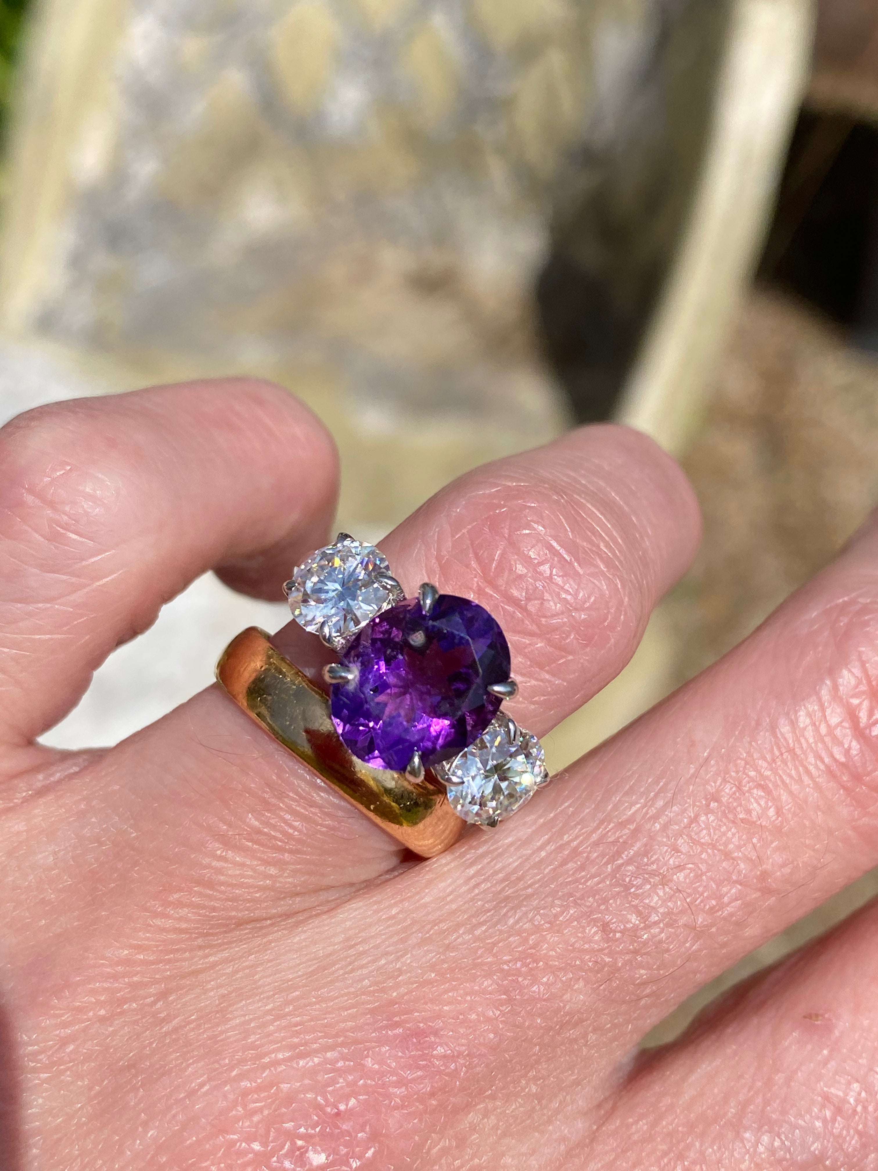 3.42 Carat Oval Cut Amethyst and 1.85 Carat Moissanite Three Stone Ring in Sterling Silver