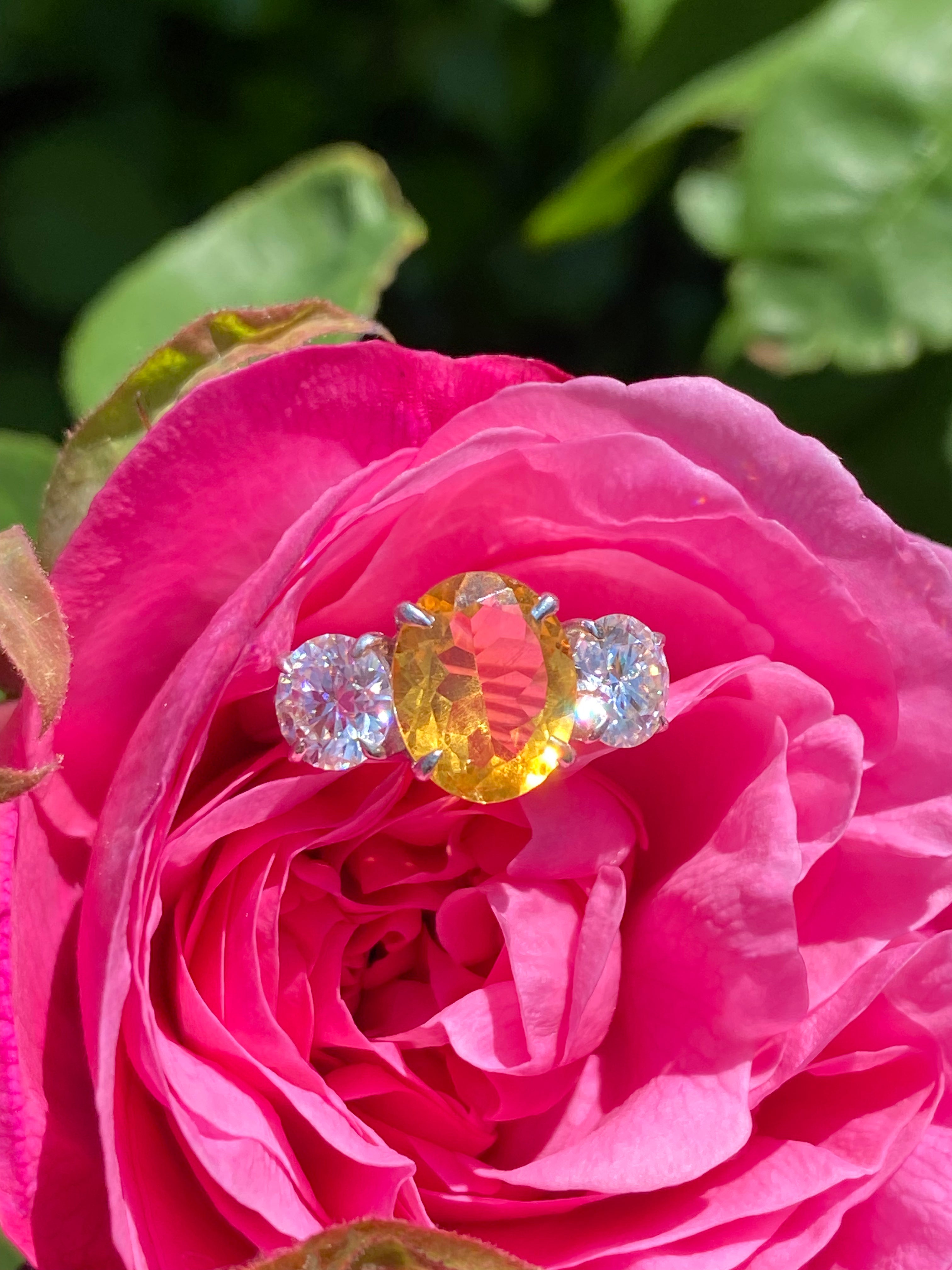 2.66 Carat Oval Cut Citrine and 1.85 Carat Moissanite Three Stone Ring in Sterling Silver