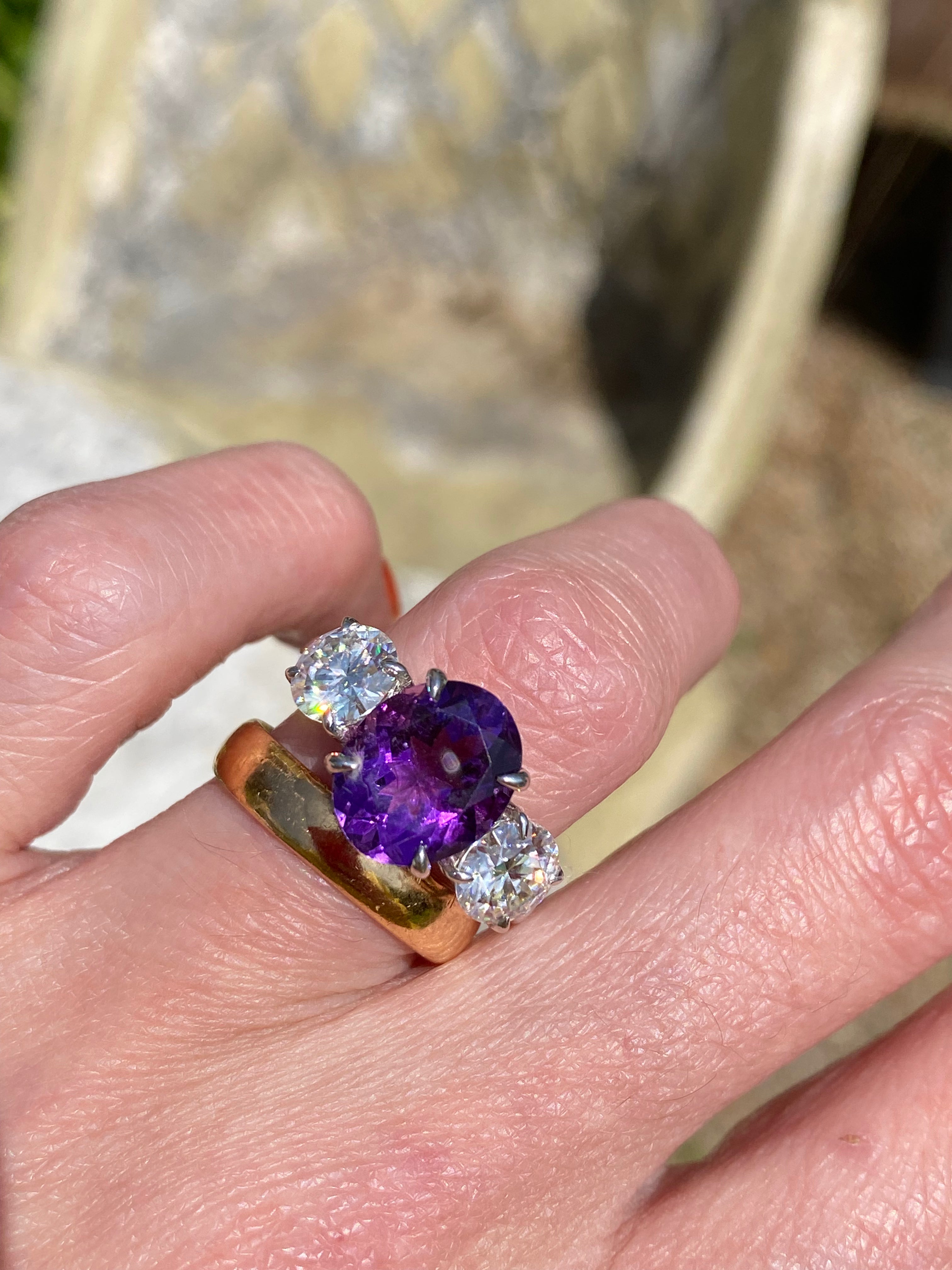 3.42 Carat Oval Cut Amethyst and 1.85 Carat Moissanite Three Stone Ring in Sterling Silver