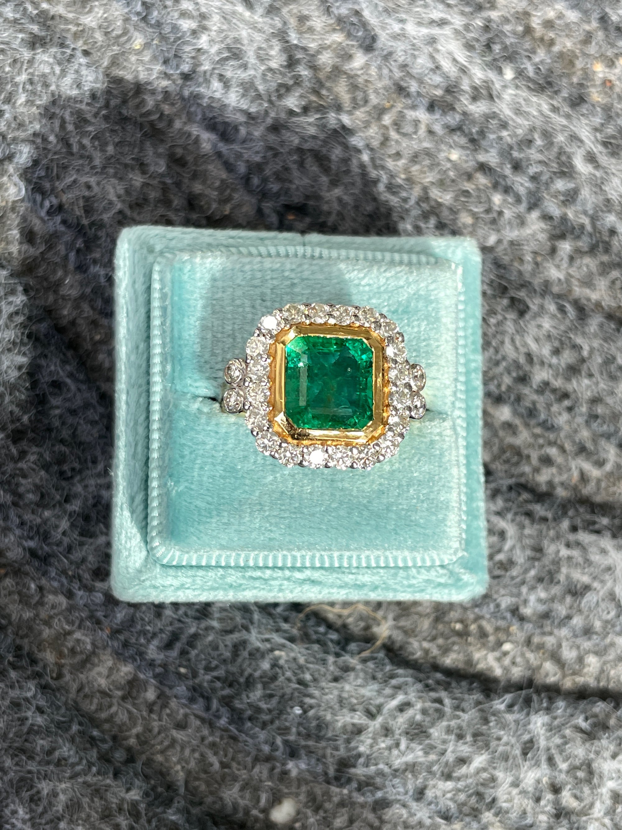 3 Carat Emerald and Diamond Halo Bezel Set Cocktail Engagement Ring in White and Yellow Gold 
