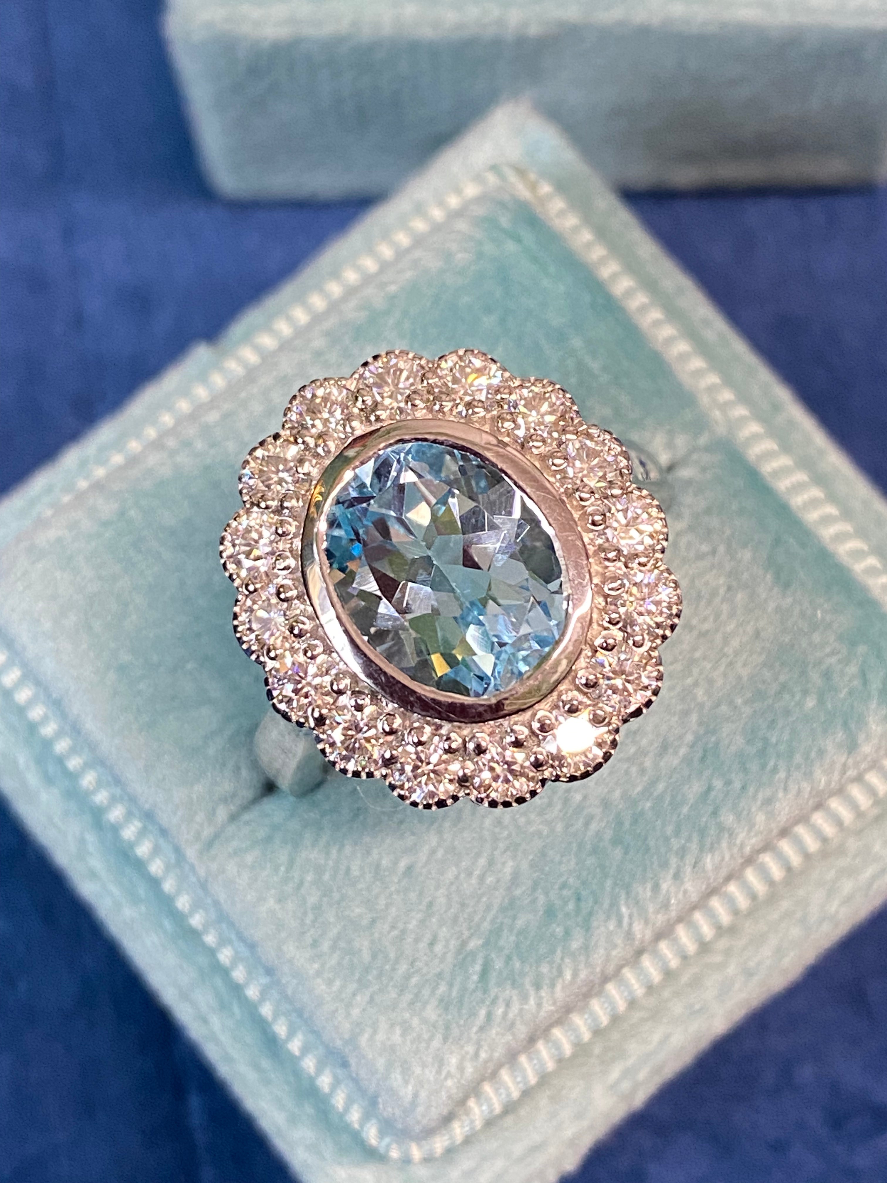4.25 CTW Oval Cut Blue Topaz and Moissanite Halo Cocktail Ring