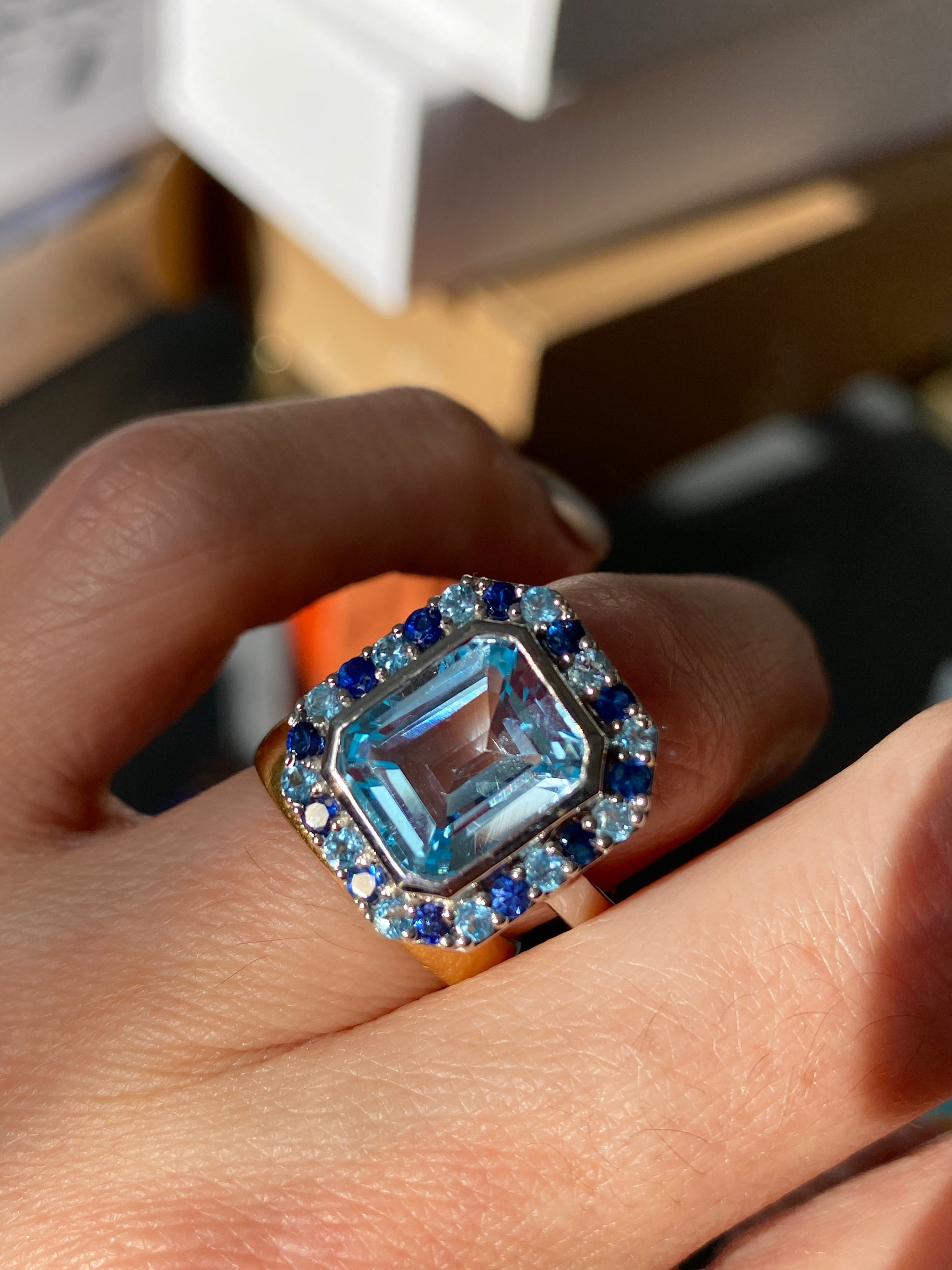 Blue Topaz and Blue Sapphire Halo Cocktail Ring in Sterling Silver