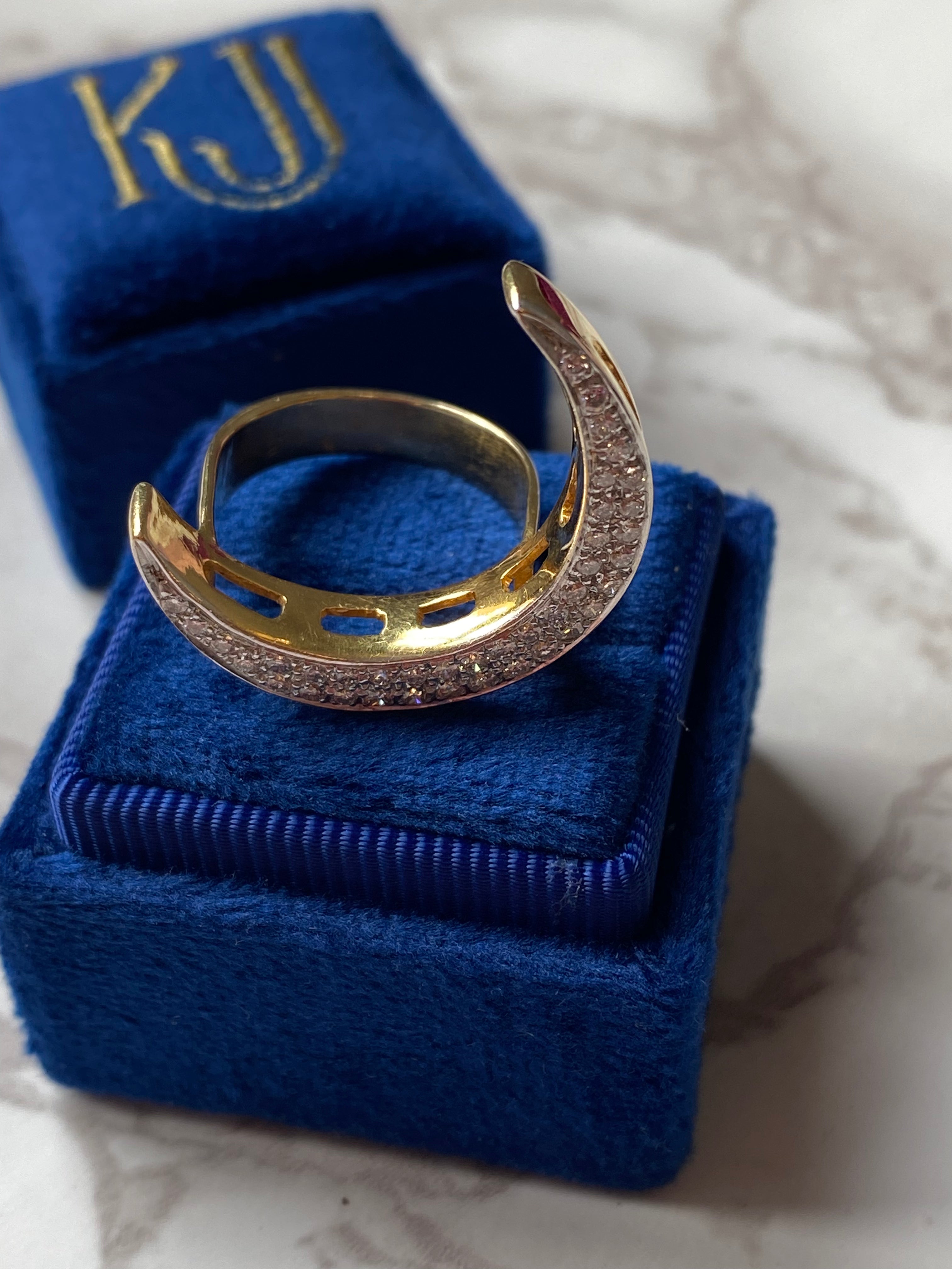 Diamond pave crescent moon cocktail ring in yellow gold 