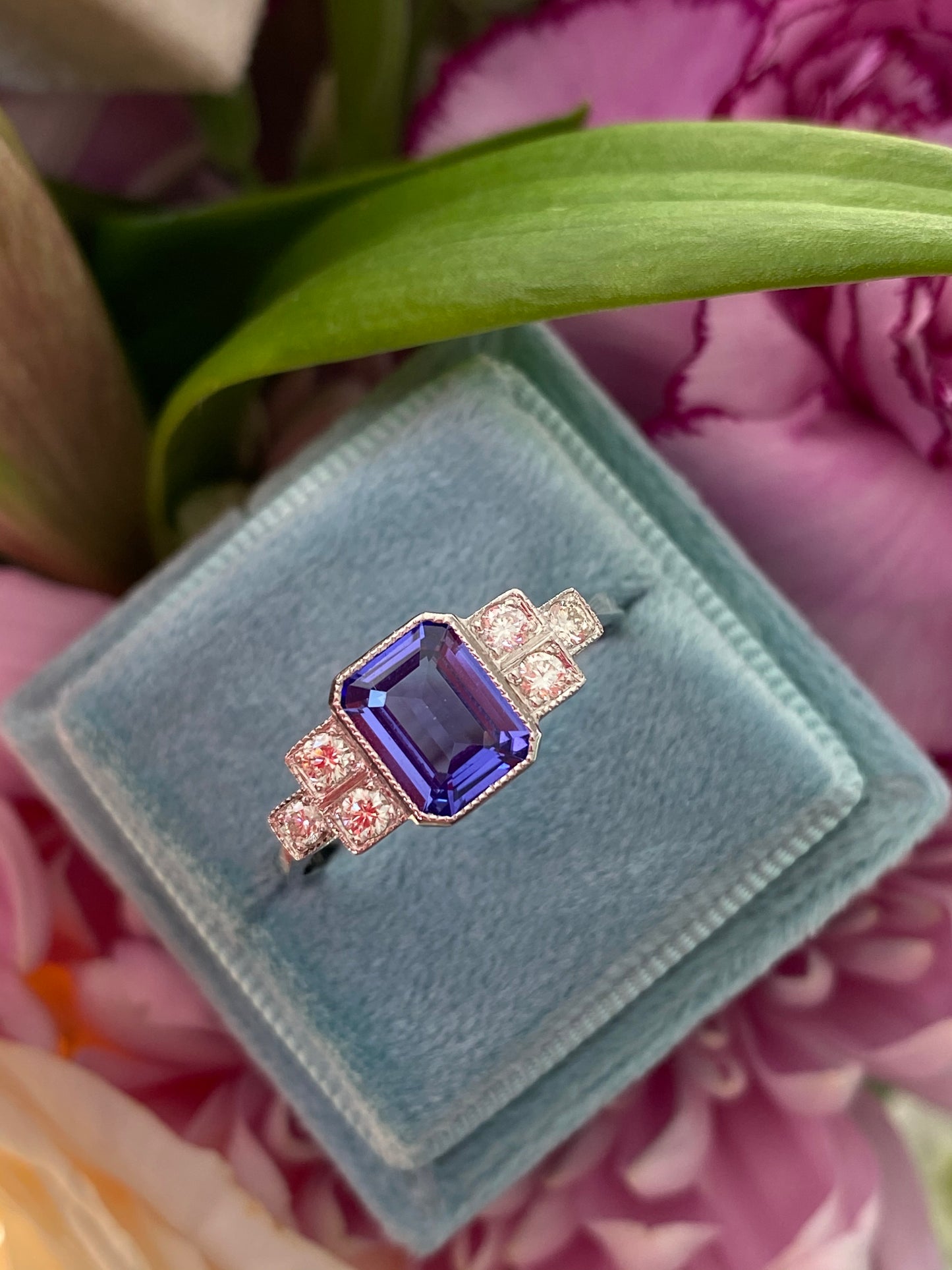 1.50 Carat Emerald Cut Tanzanite and Diamond Engagement Ring in Platinum 