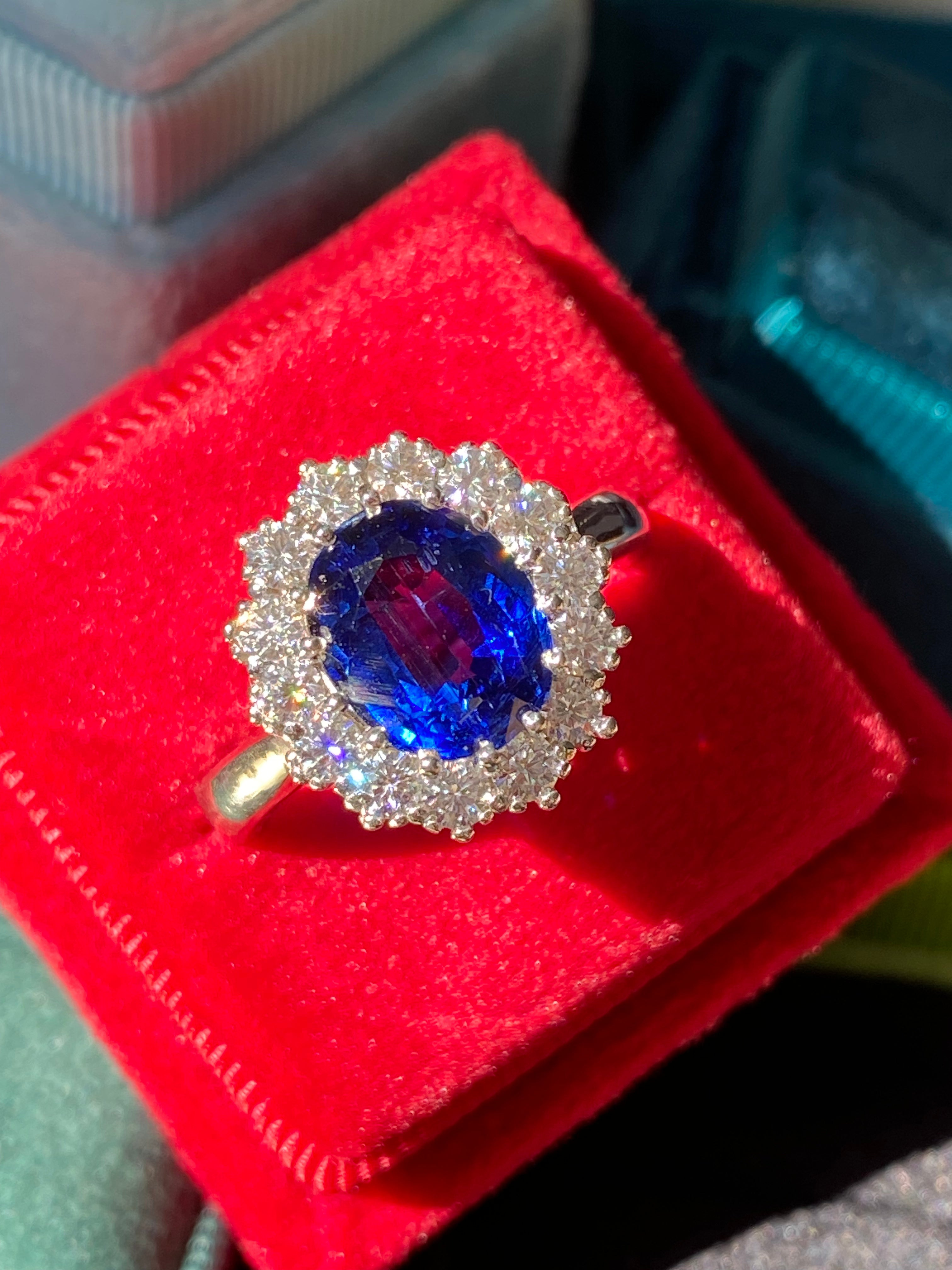 4.50 CTW Oval Cut Kyanite and Moissanite Halo Ring in Sterling Silver