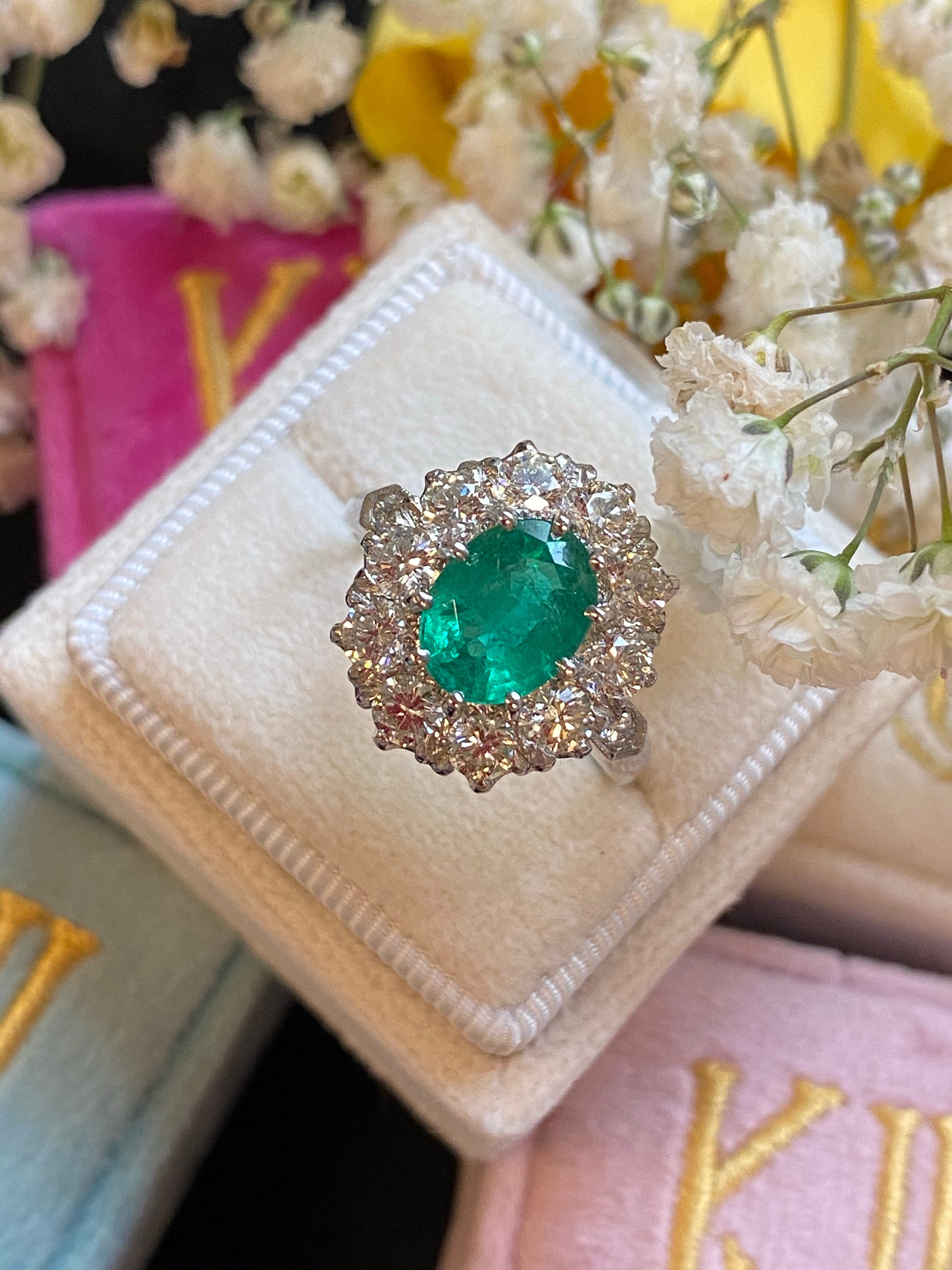 1.54 Carat Oval Cut Emerald and Diamond Halo Engagement Ring in Platinum 