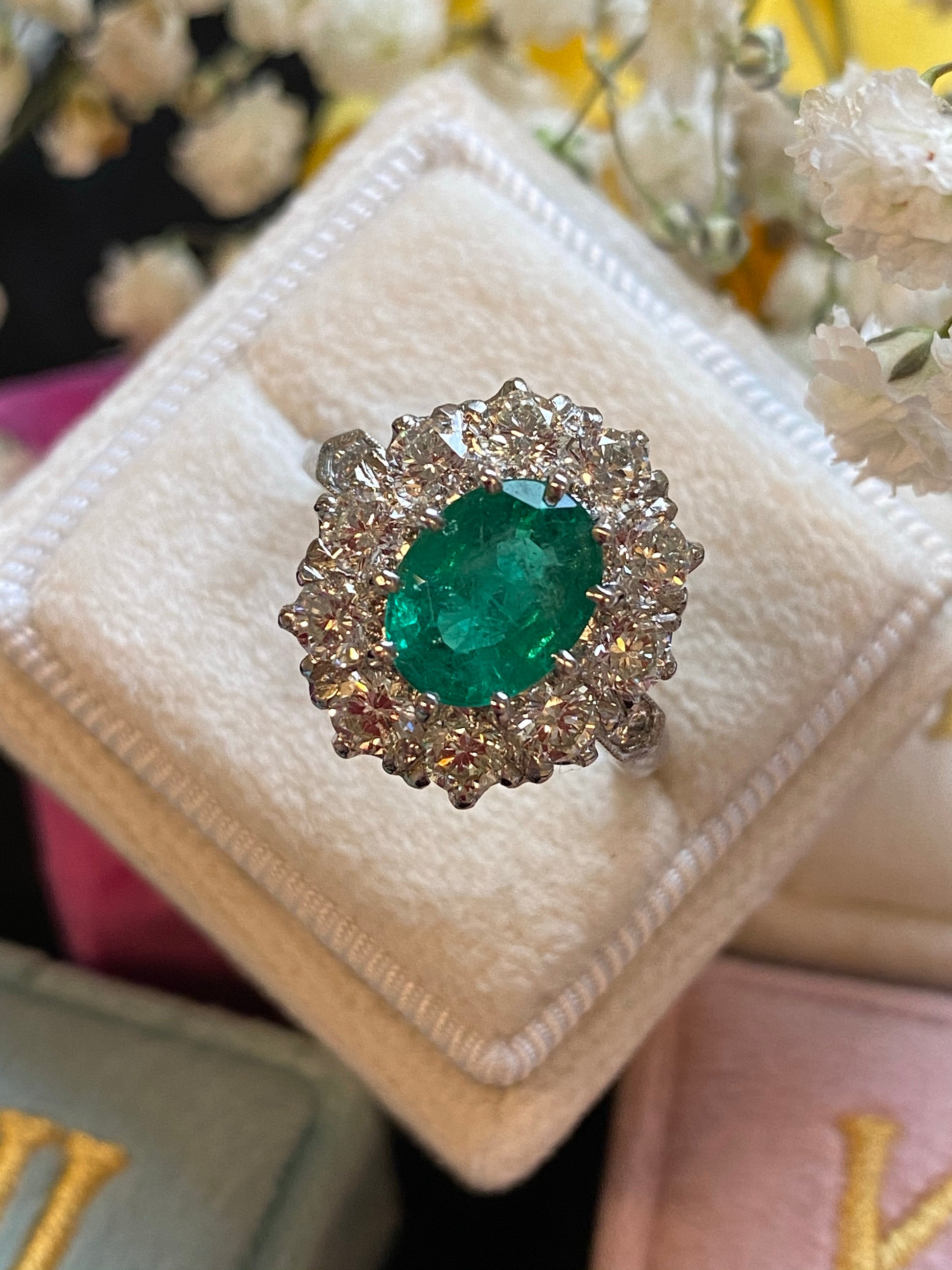 1.54 Carat Oval Cut Emerald and Diamond Halo Engagement Ring in Platinum 