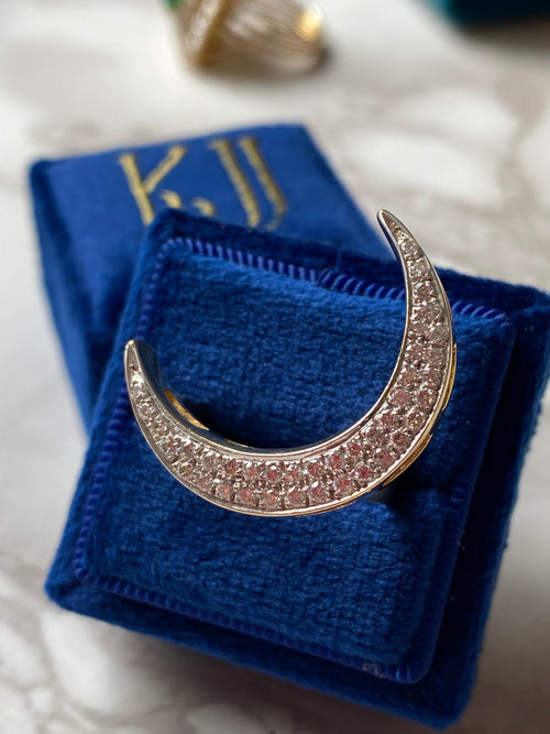 Diamond pave crescent moon cocktail ring in yellow gold 
