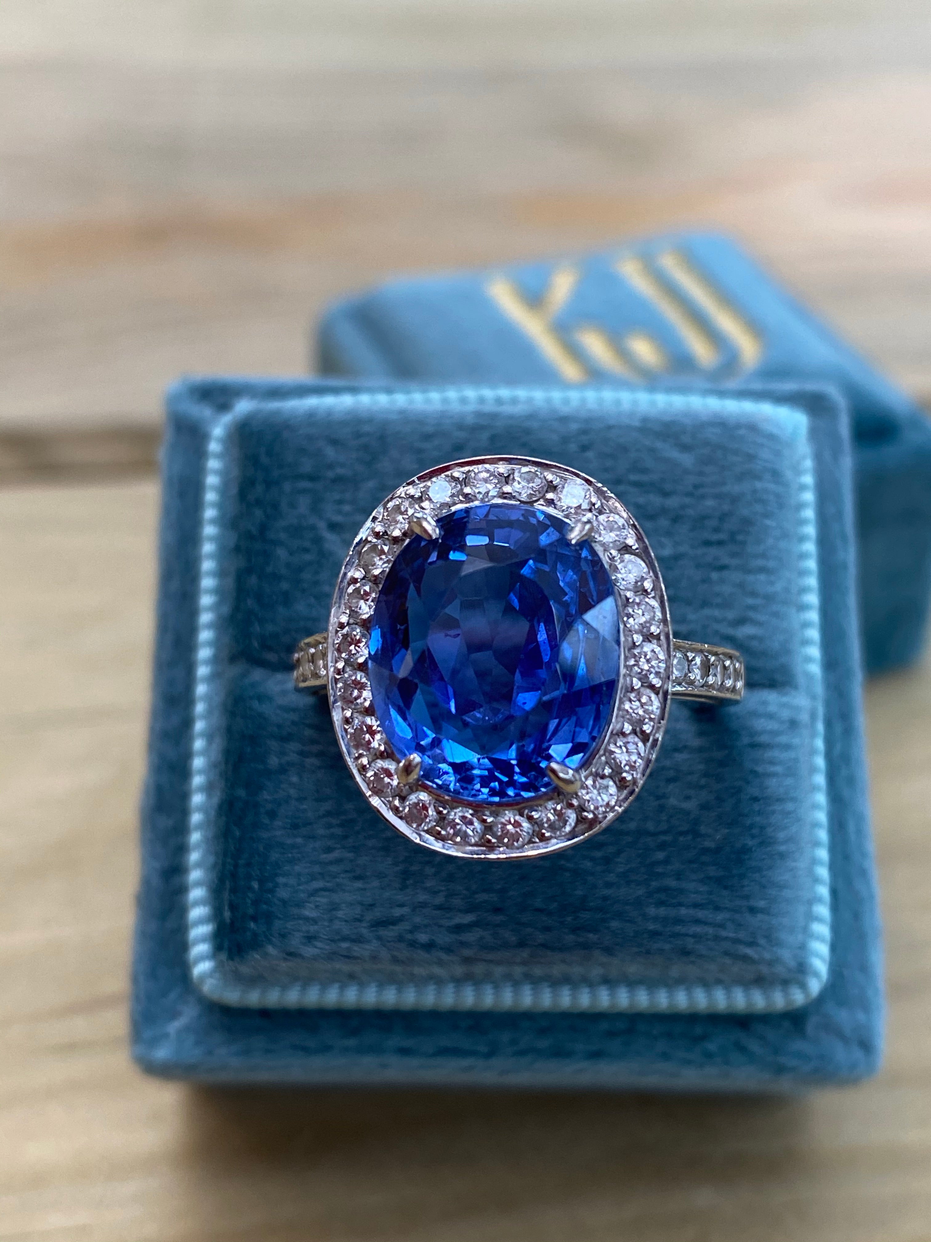 9.50 Oval-cut Carat Blue Ceylon Sapphire and DIamond Halo Ring 