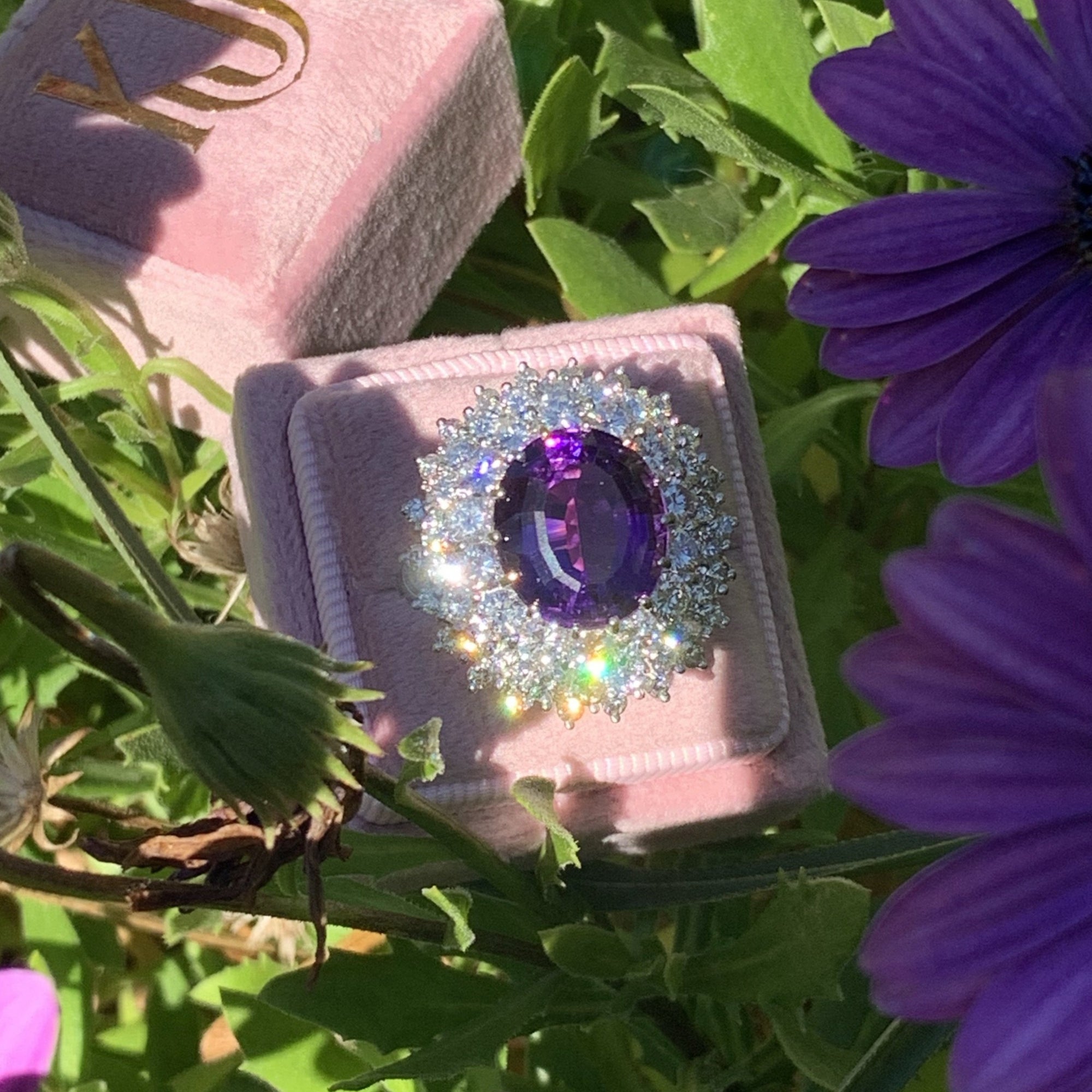 7.30 Carat Oval Cut Amethyst and Diamond Halo Ring in 18ct White Gold