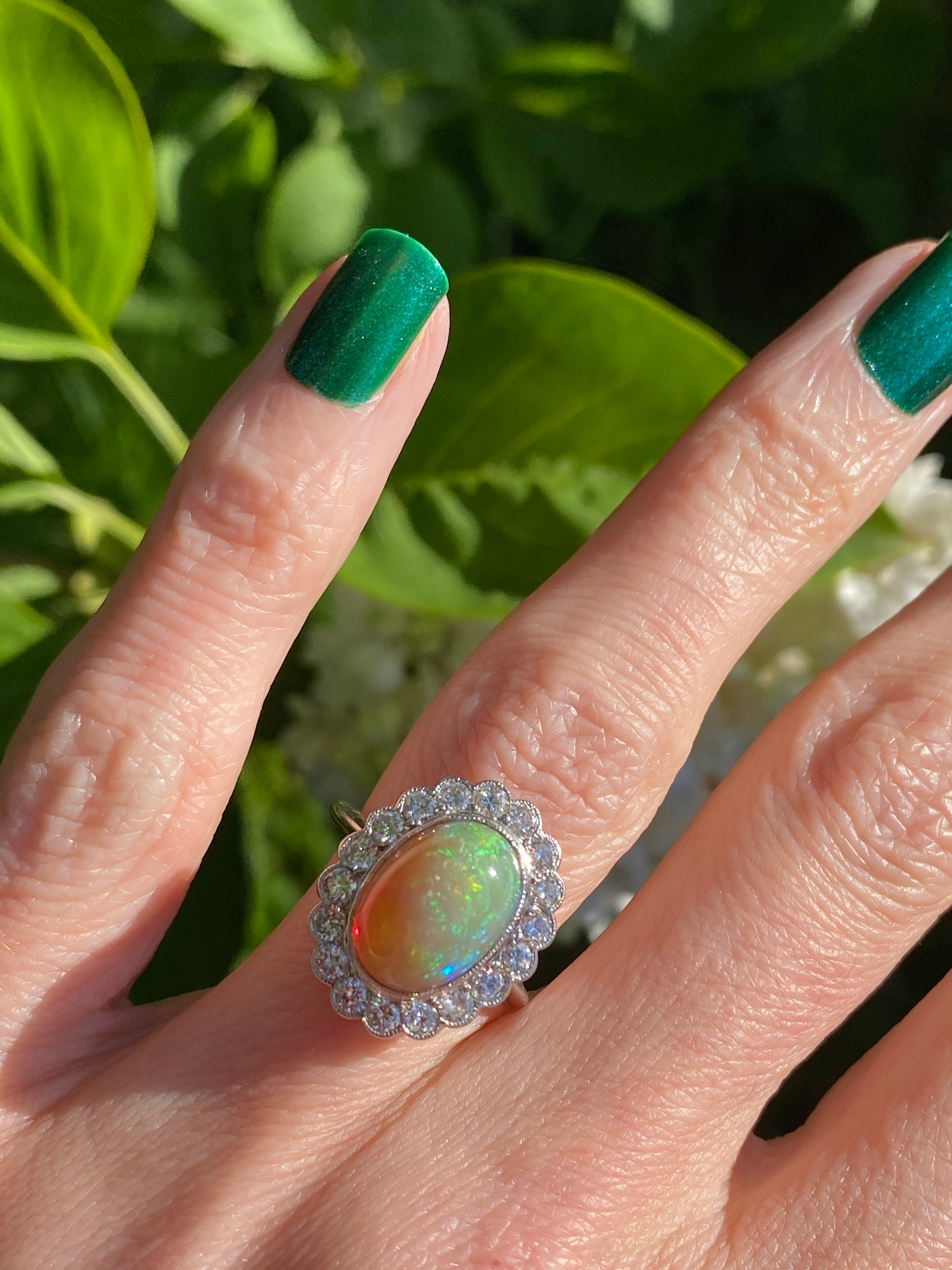 3.00 Carat Opal and Diamond Halo Ring in 18ct White Gold
