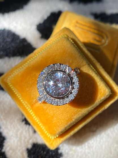 4.62 CTW No Heat White Sapphire and Diamond Halo Engagement Ring in 18ct White Gold