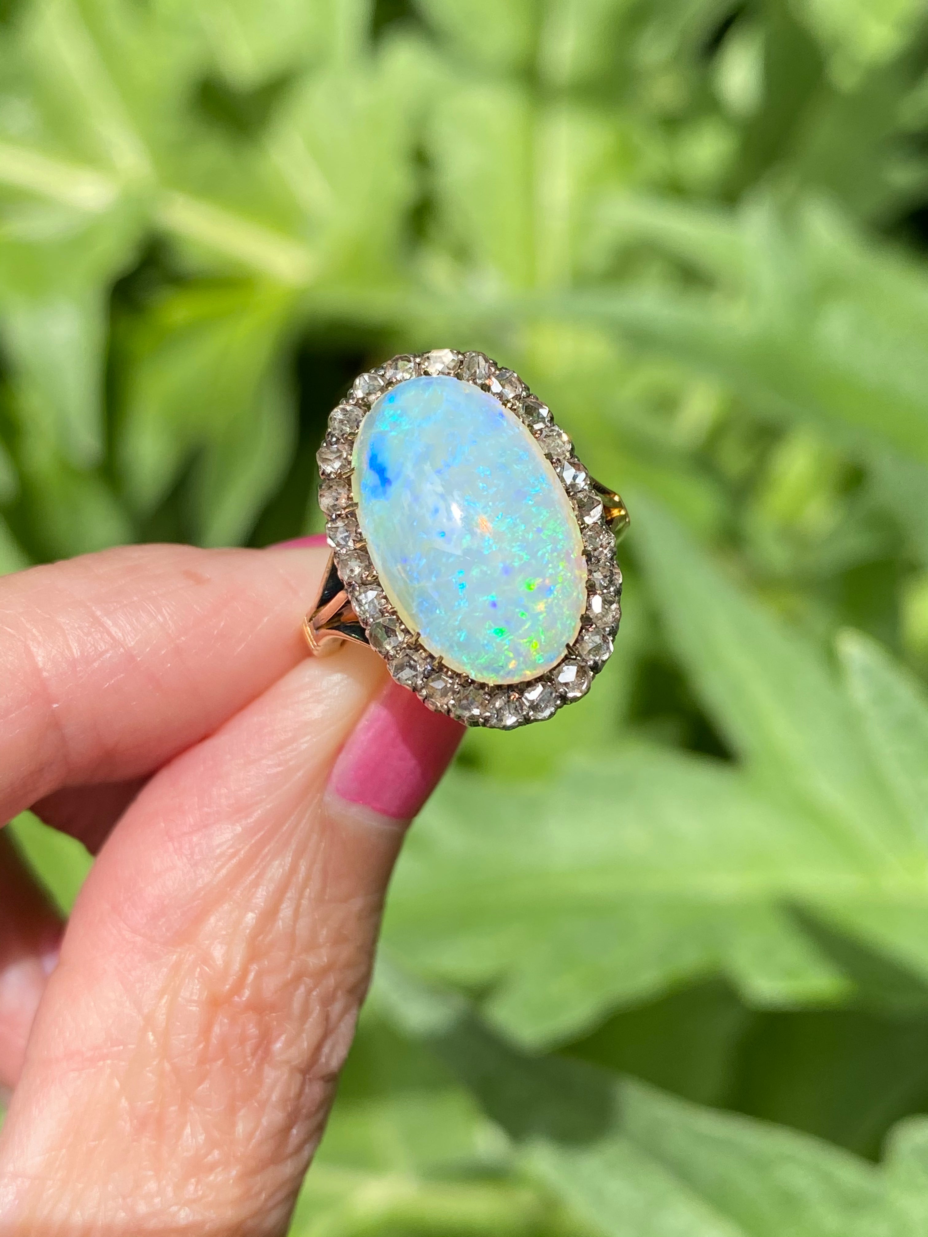 Antique Victorian White Opal and Old Euro Cut Diamond halo cocktail ring in Gold 