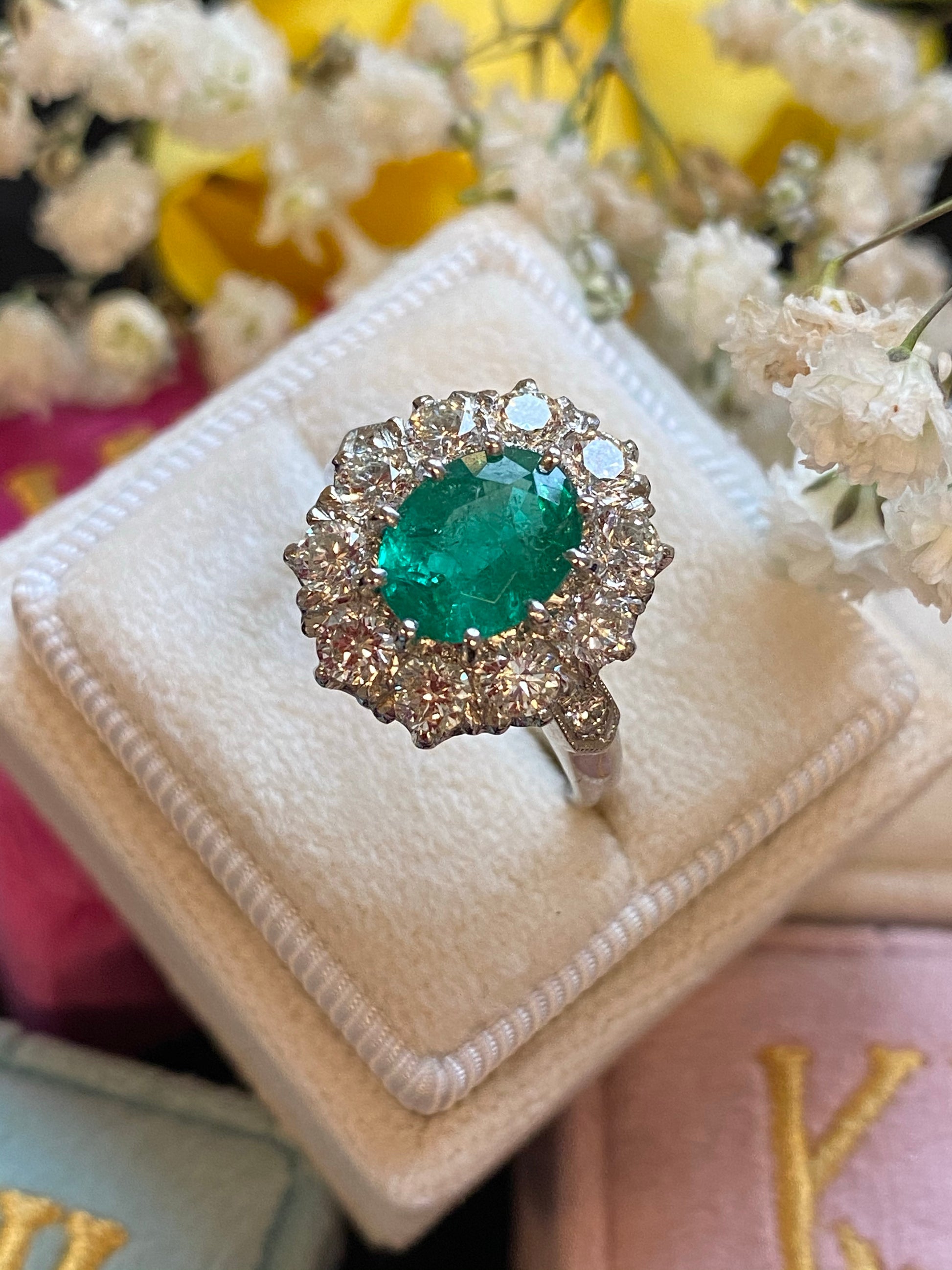 1.54 Carat Oval Cut Emerald and Diamond Halo Engagement Ring in Platinum 