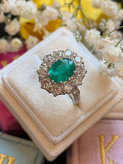 1.54 Carat Oval Cut Emerald and Diamond Halo Engagement Ring in Platinum 