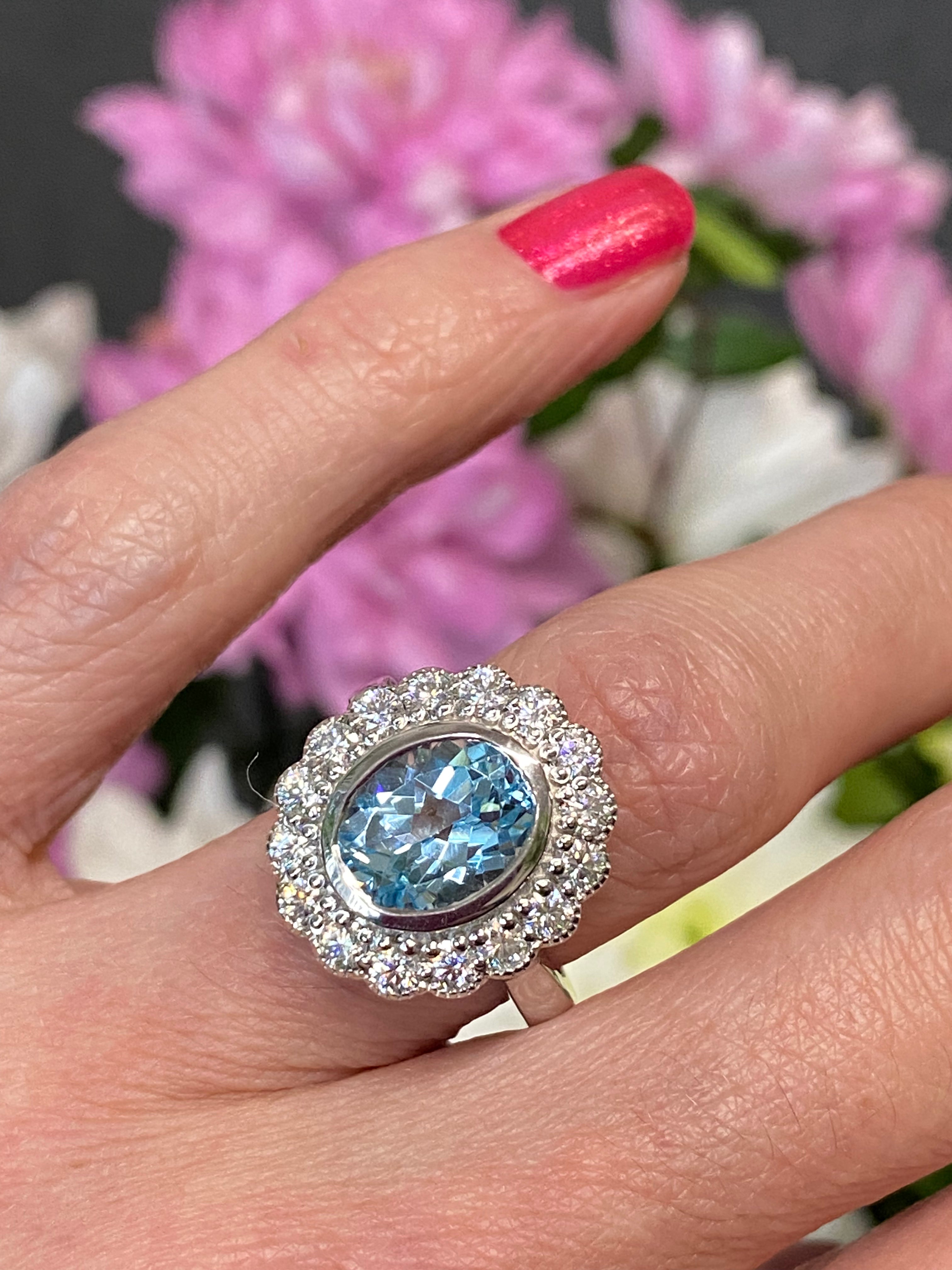 Blue Topaz and Moissanite Halo Cocktail Engagement Ring in Sterling Silver 
