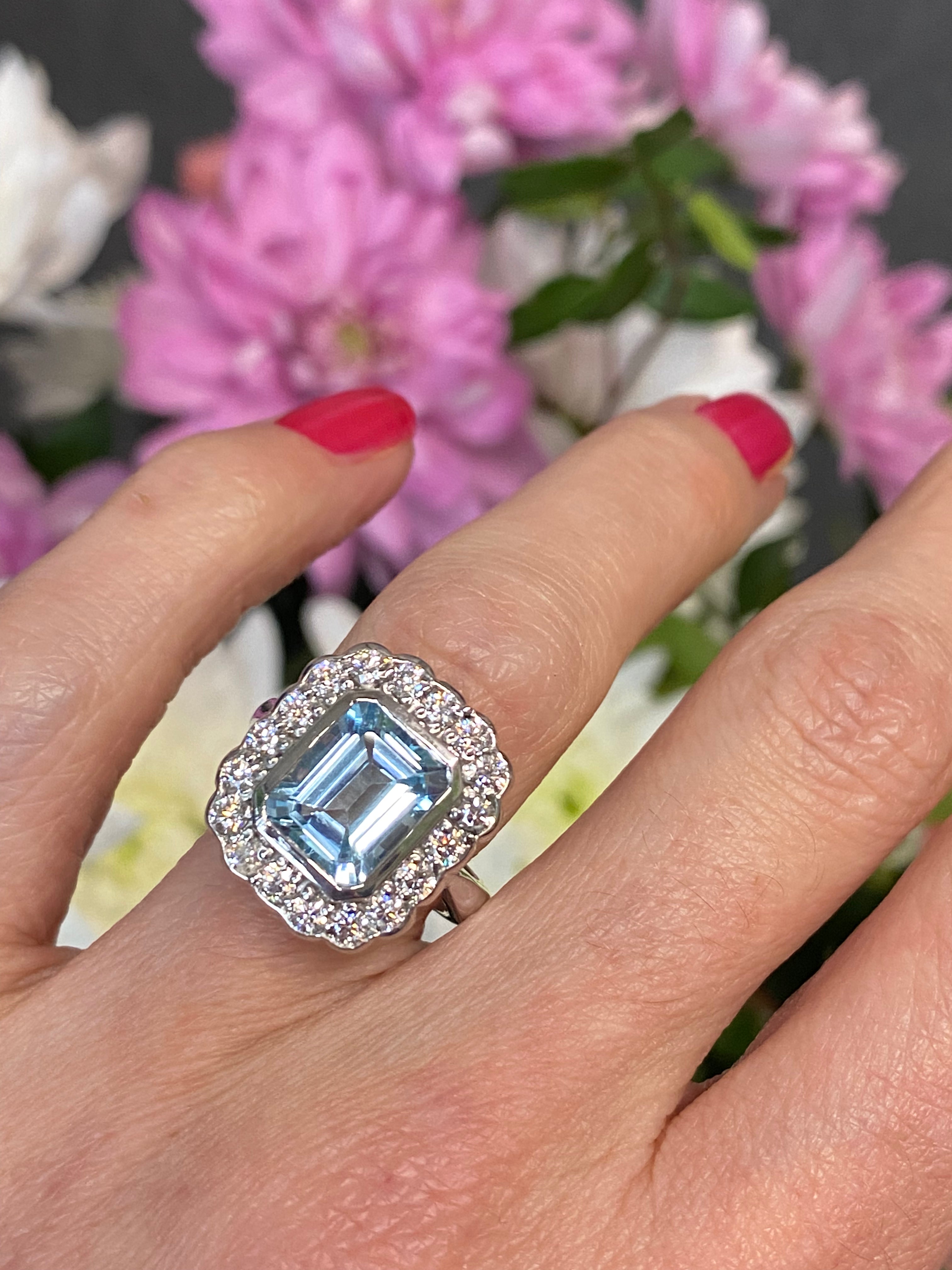 Emerald cut Blue Topaz and Moissanite Halo Cocktail Engagement Ring in Sterling Silver under 1000 Katherine James Jewellery  