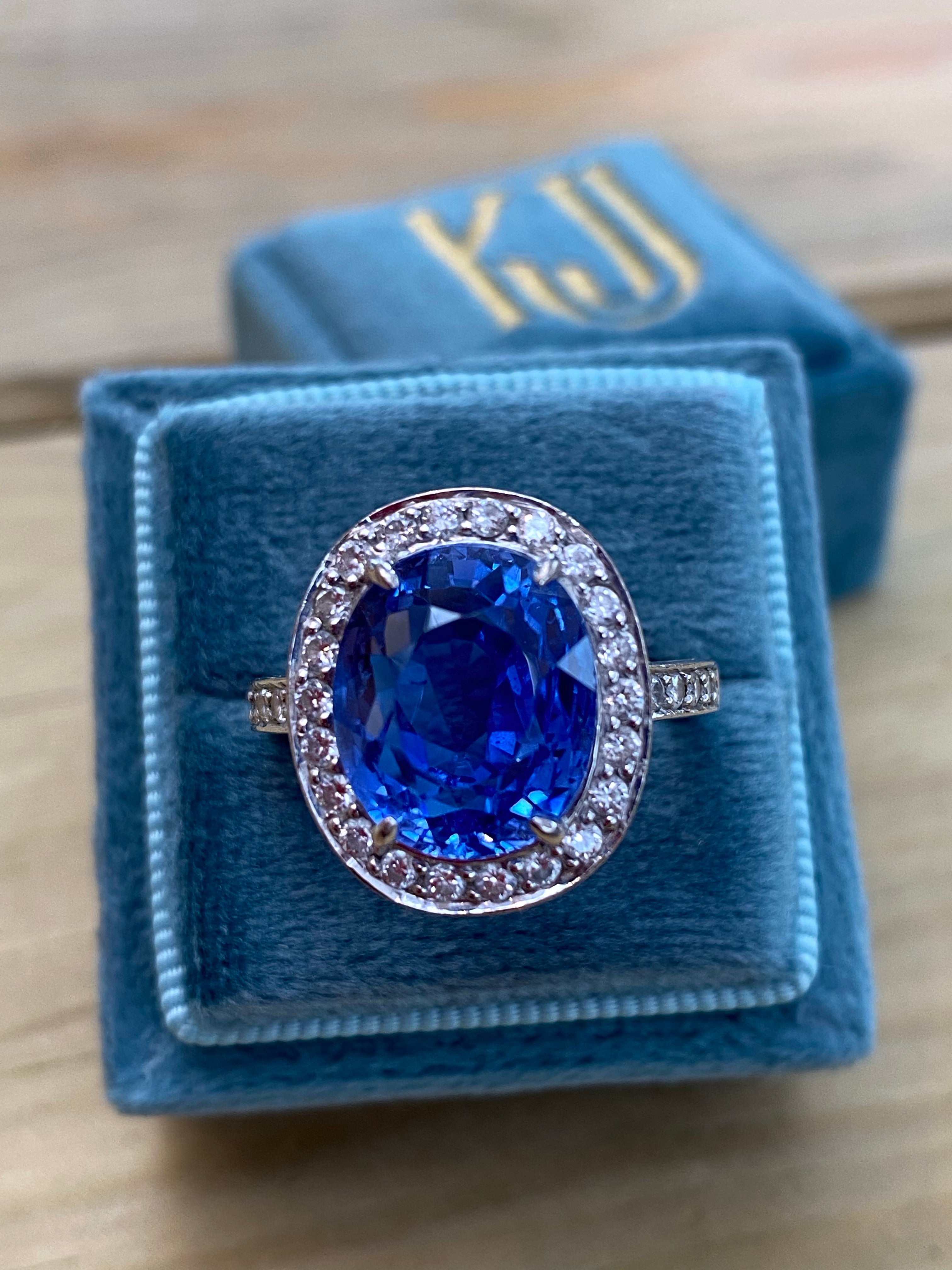 9.50 Oval-cut Carat Blue Ceylon Sapphire and DIamond Halo Ring 