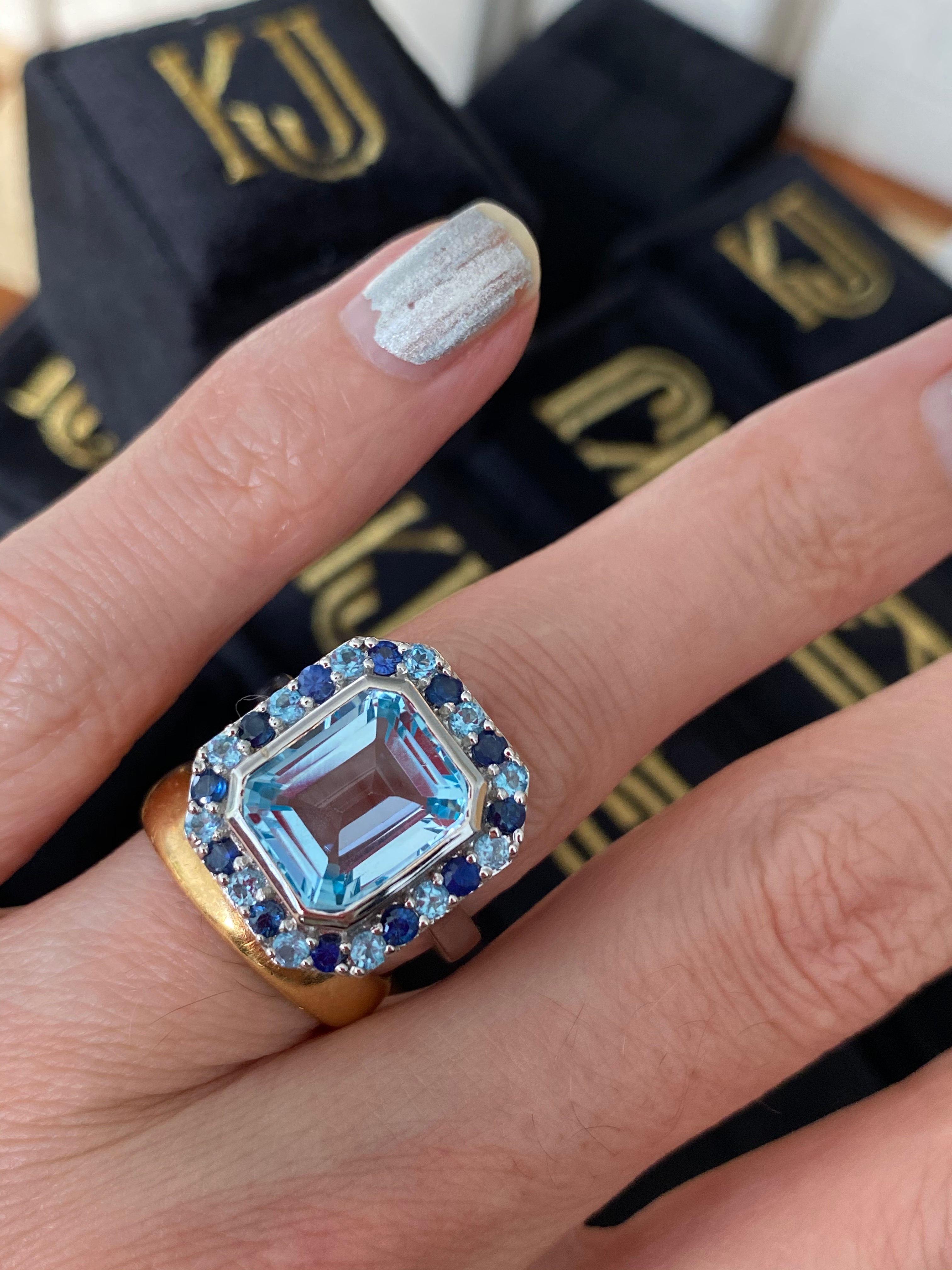 Blue Topaz and Blue Sapphire Halo Cocktail Ring in Sterling Silver