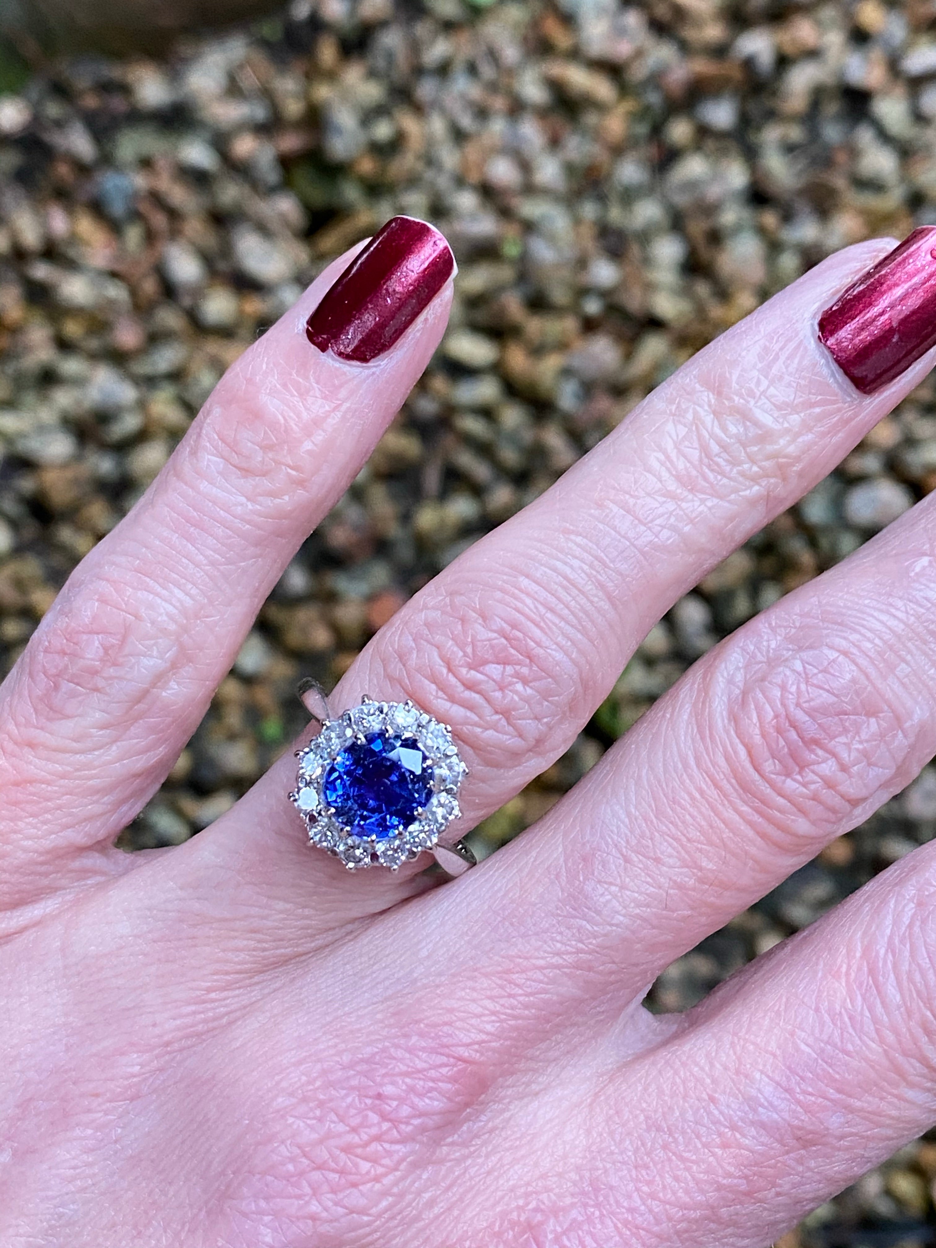 Antique 2.50 Carat Colour Change Sapphire and Diamond Halo Engagement Ring in Platinum