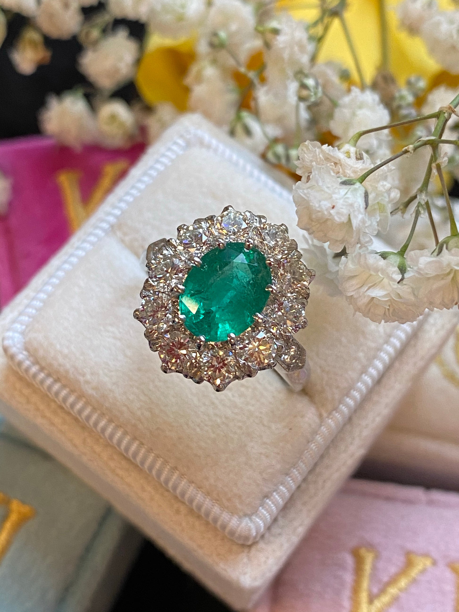 1.54 Carat Oval Cut Emerald and Diamond Halo Engagement Ring in Platinum 