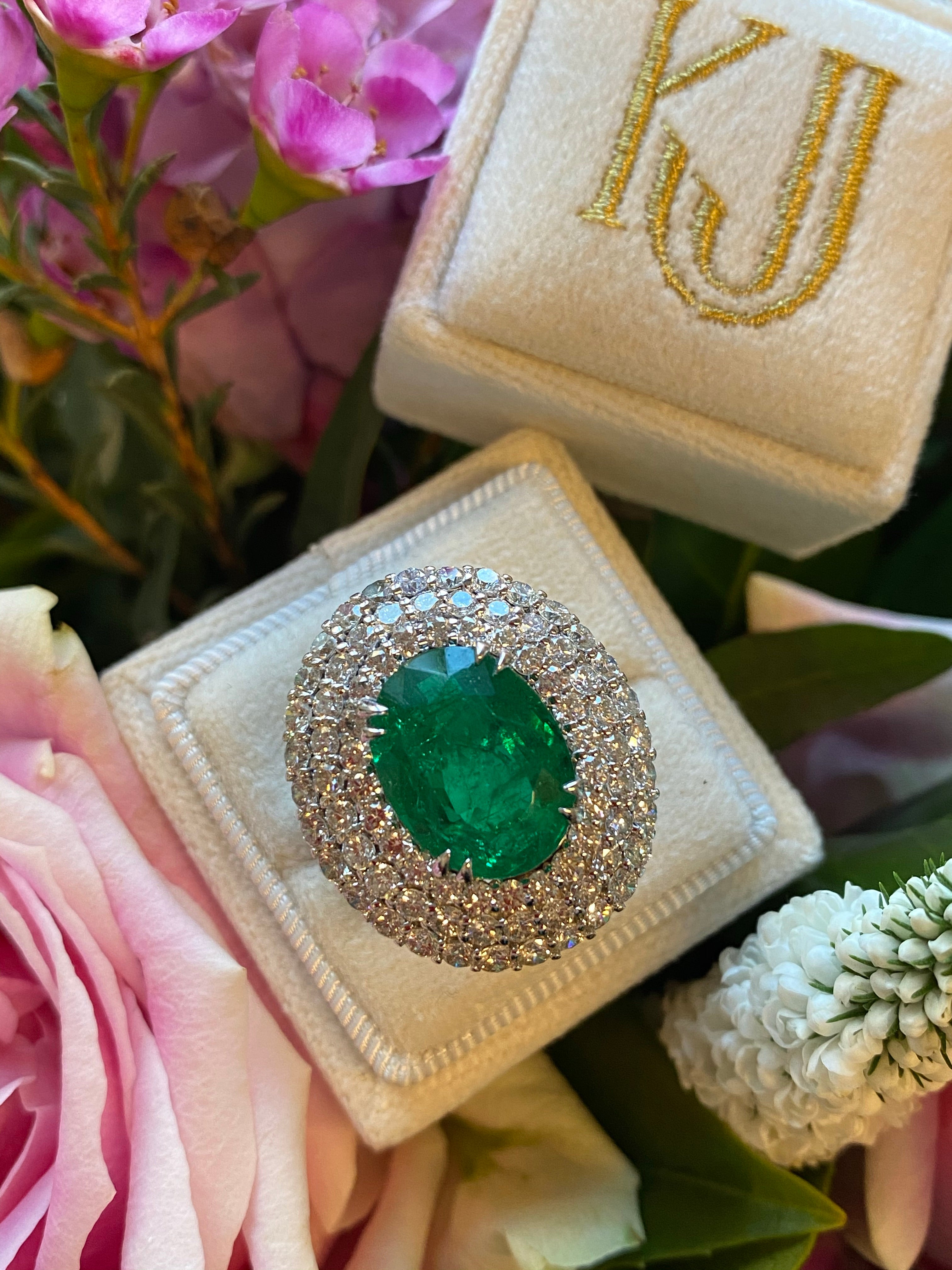 7 Carat Oval Cut Emerald and Triple Diamond Halo Engagement Cocktail Ring in Platinum 
