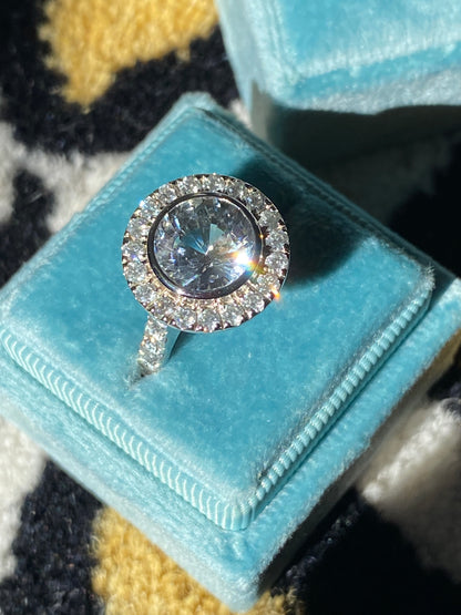 4.62 CTW No Heat White Sapphire and Diamond Halo Engagement Ring in 18ct White Gold