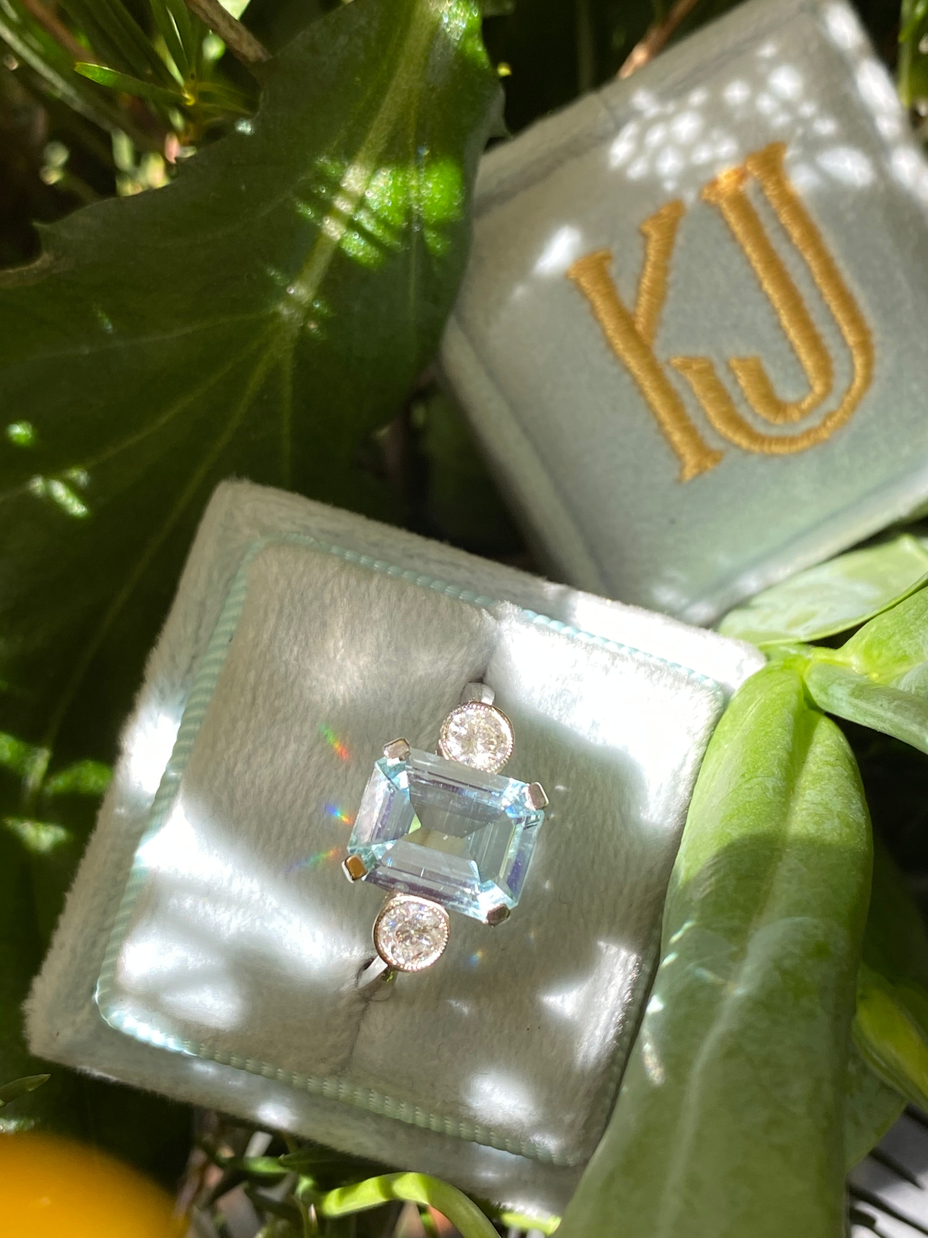 2.75 Carat Emerald Cut Aquamarine and Diamond Three Stone Engagement Ring in Platinum 