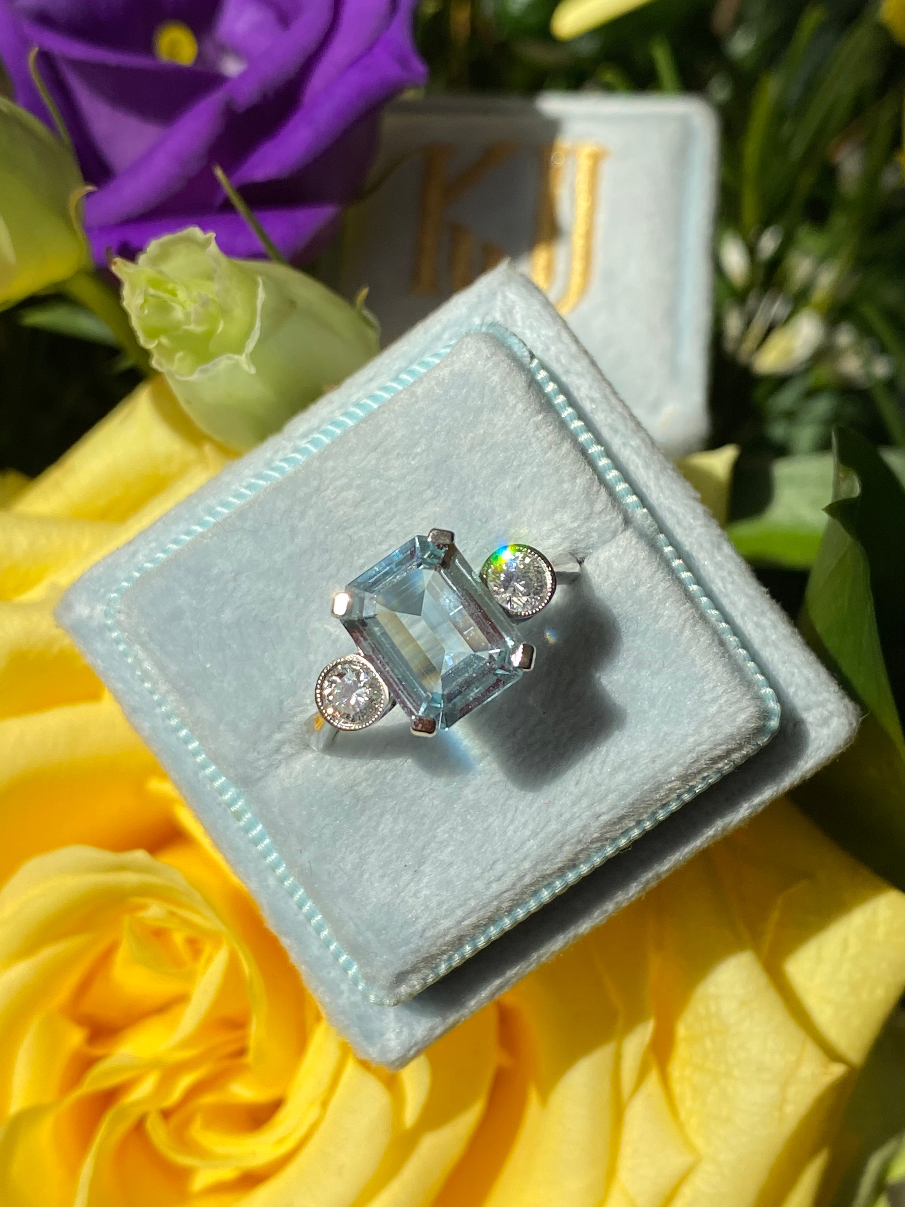 2.75 Carat Emerald Cut Aquamarine and Diamond Three Stone Engagement Ring in Platinum 