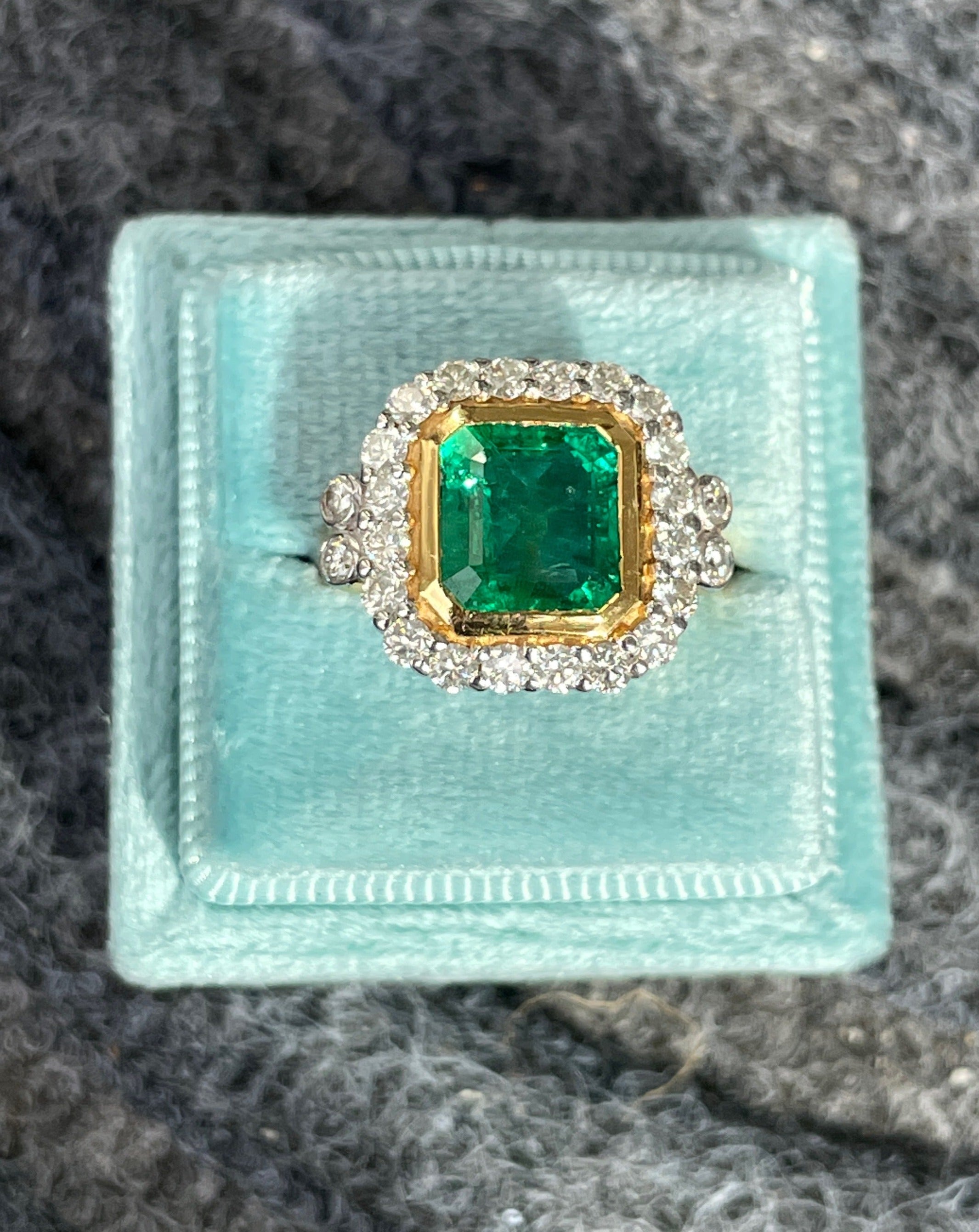 3 Carat Emerald and Diamond Halo Bezel Set Cocktail Engagement Ring in White and Yellow Gold 
