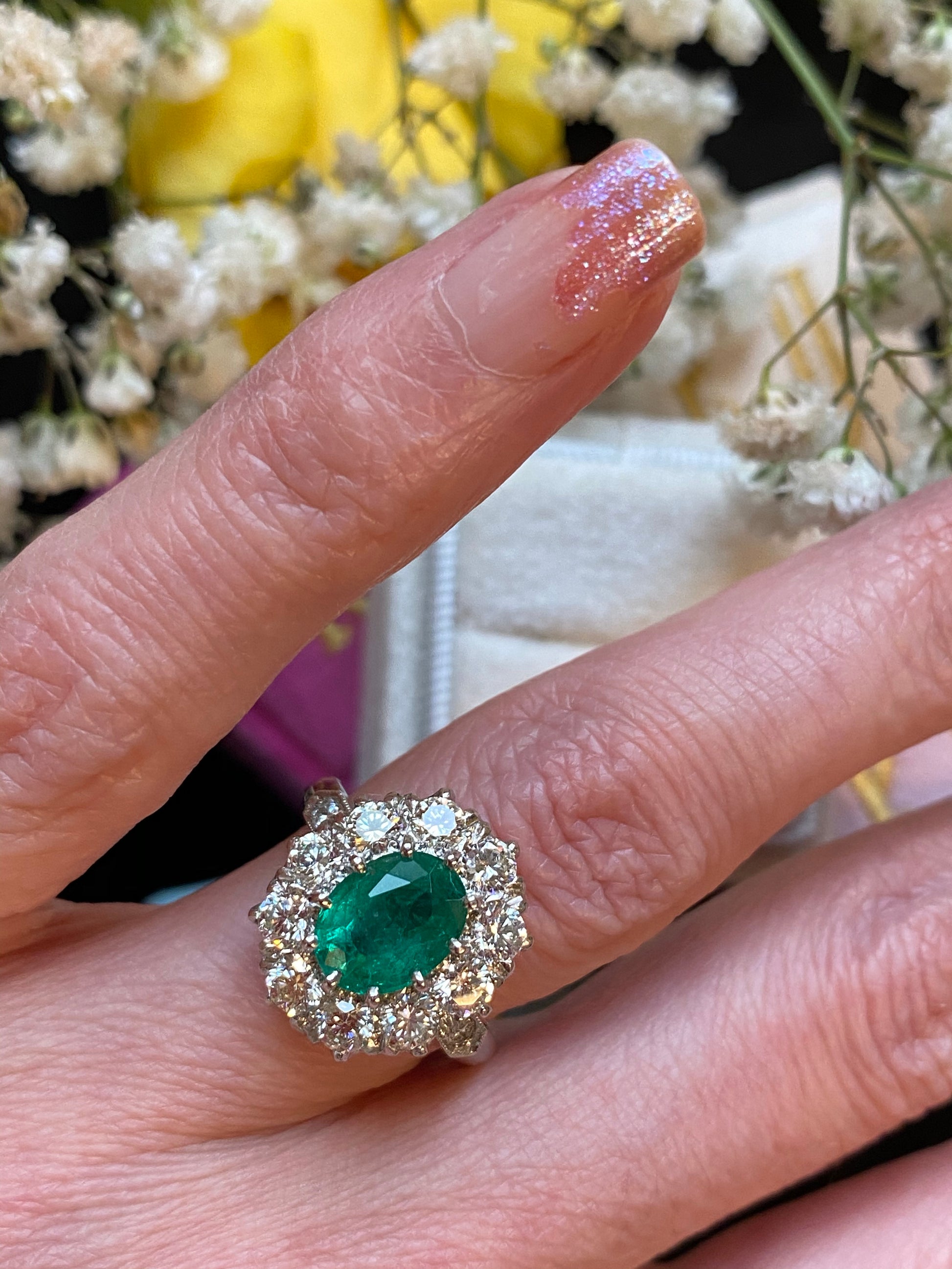 1.54 Carat Oval Cut Emerald and Diamond Halo Engagement Ring in Platinum 