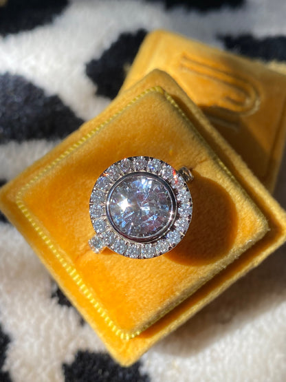 4.62 CTW No Heat White Sapphire and Diamond Halo Engagement Ring in 18ct White Gold