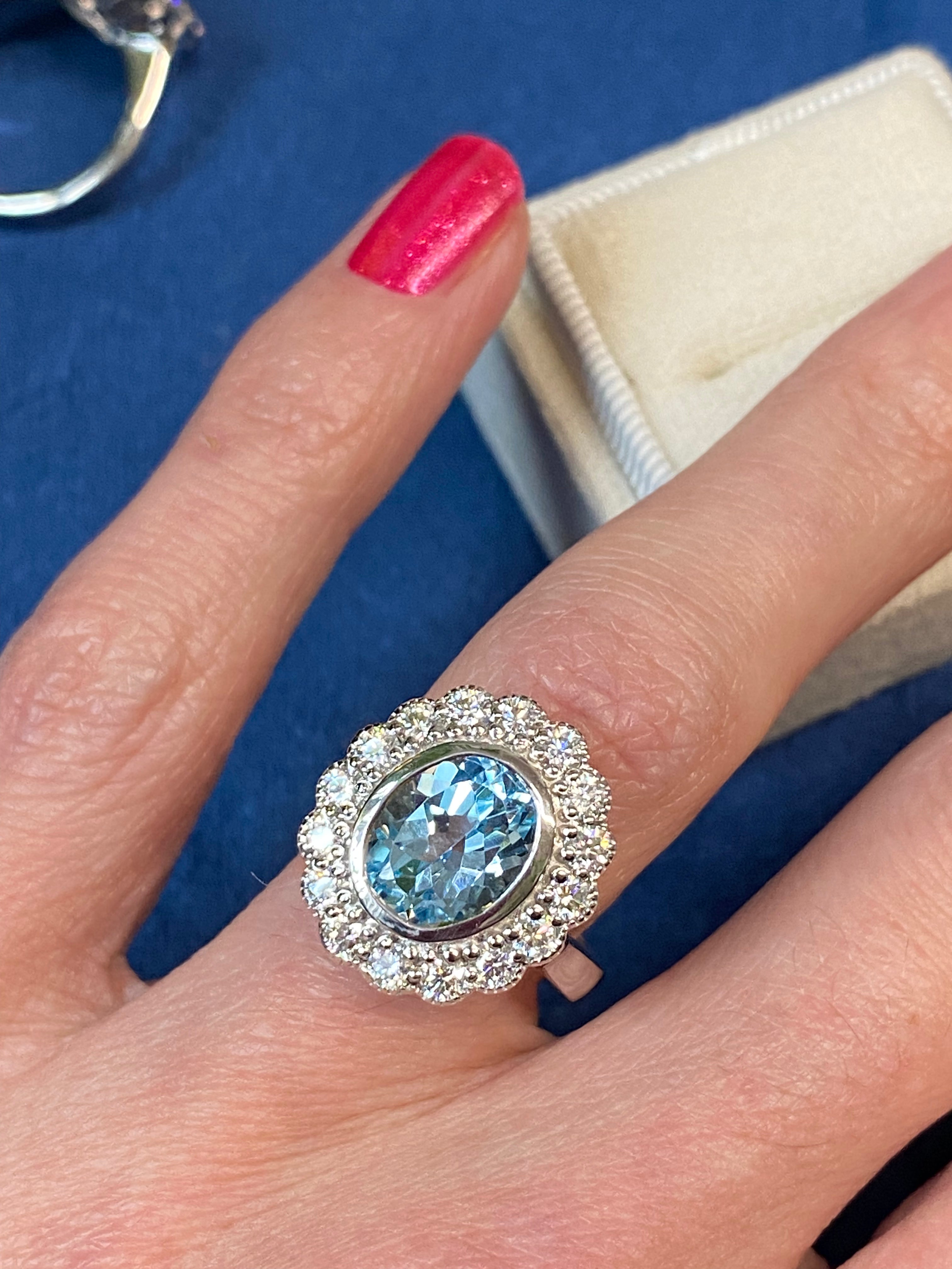 Blue Topaz and Moissanite Halo Cocktail Engagement Ring in Sterling Silver 