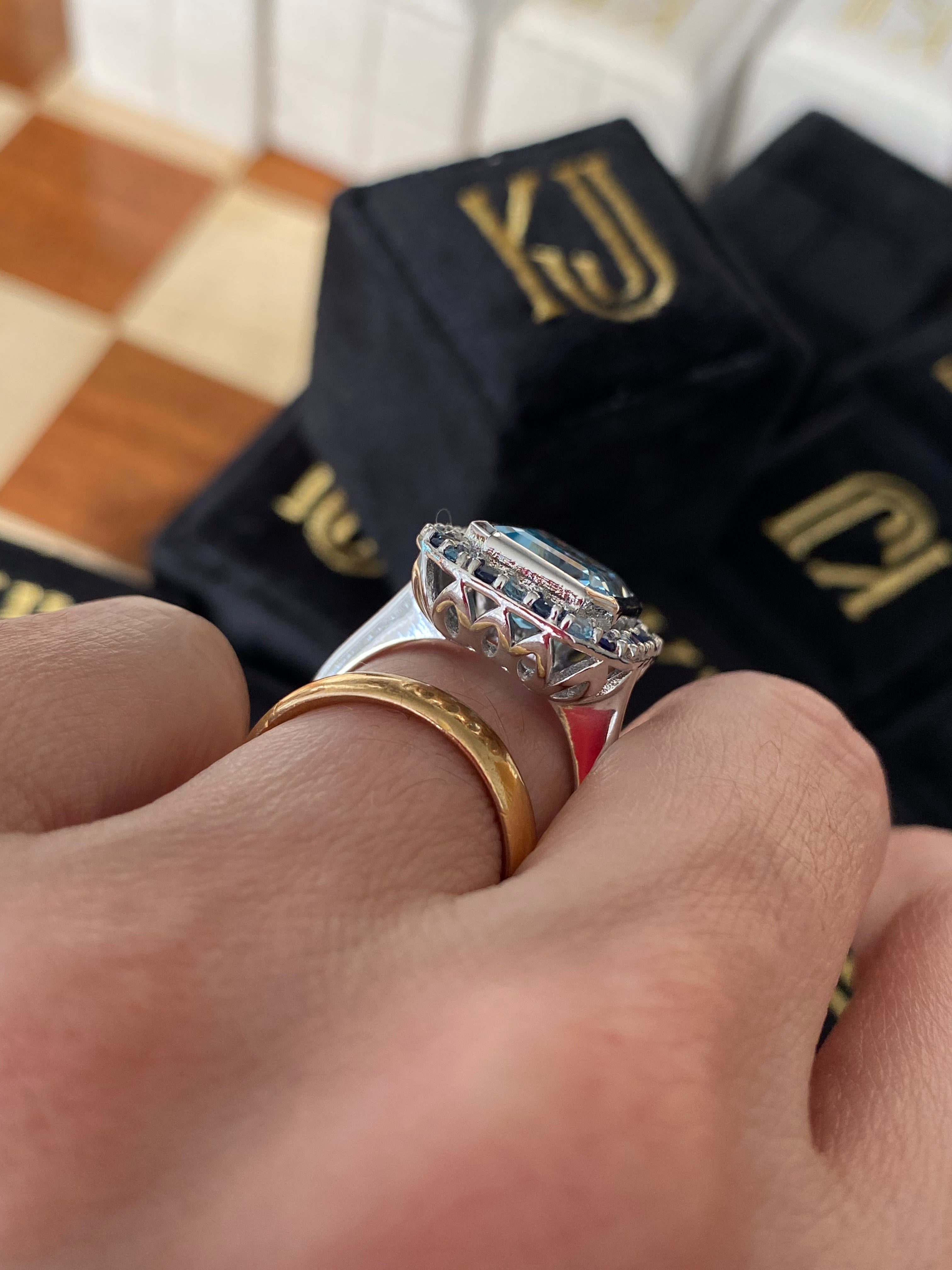 Blue Topaz and Blue Sapphire Halo Cocktail Ring in Sterling Silver