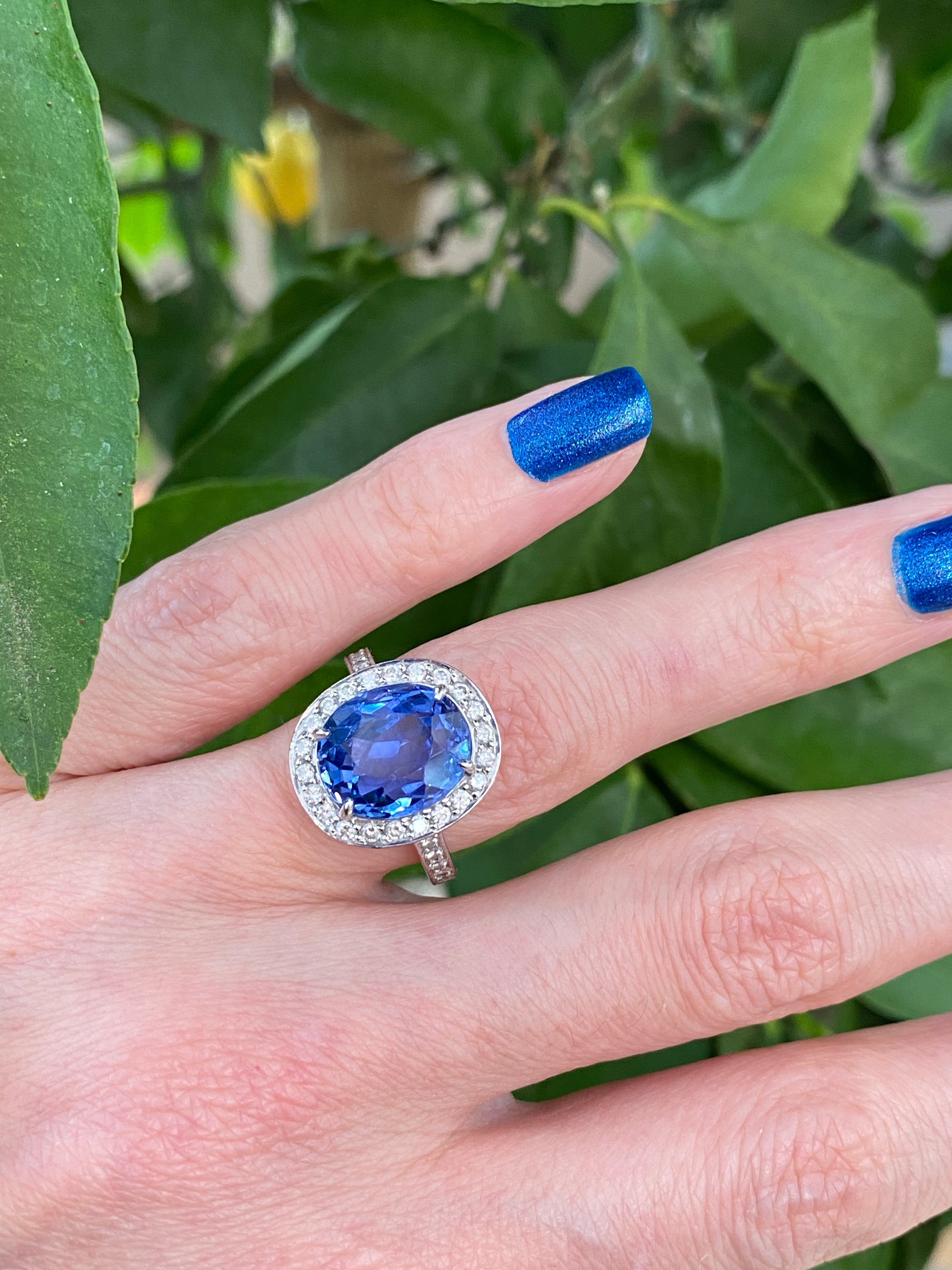 9.50 Oval-cut Carat Blue Ceylon Sapphire and DIamond Halo Ring 