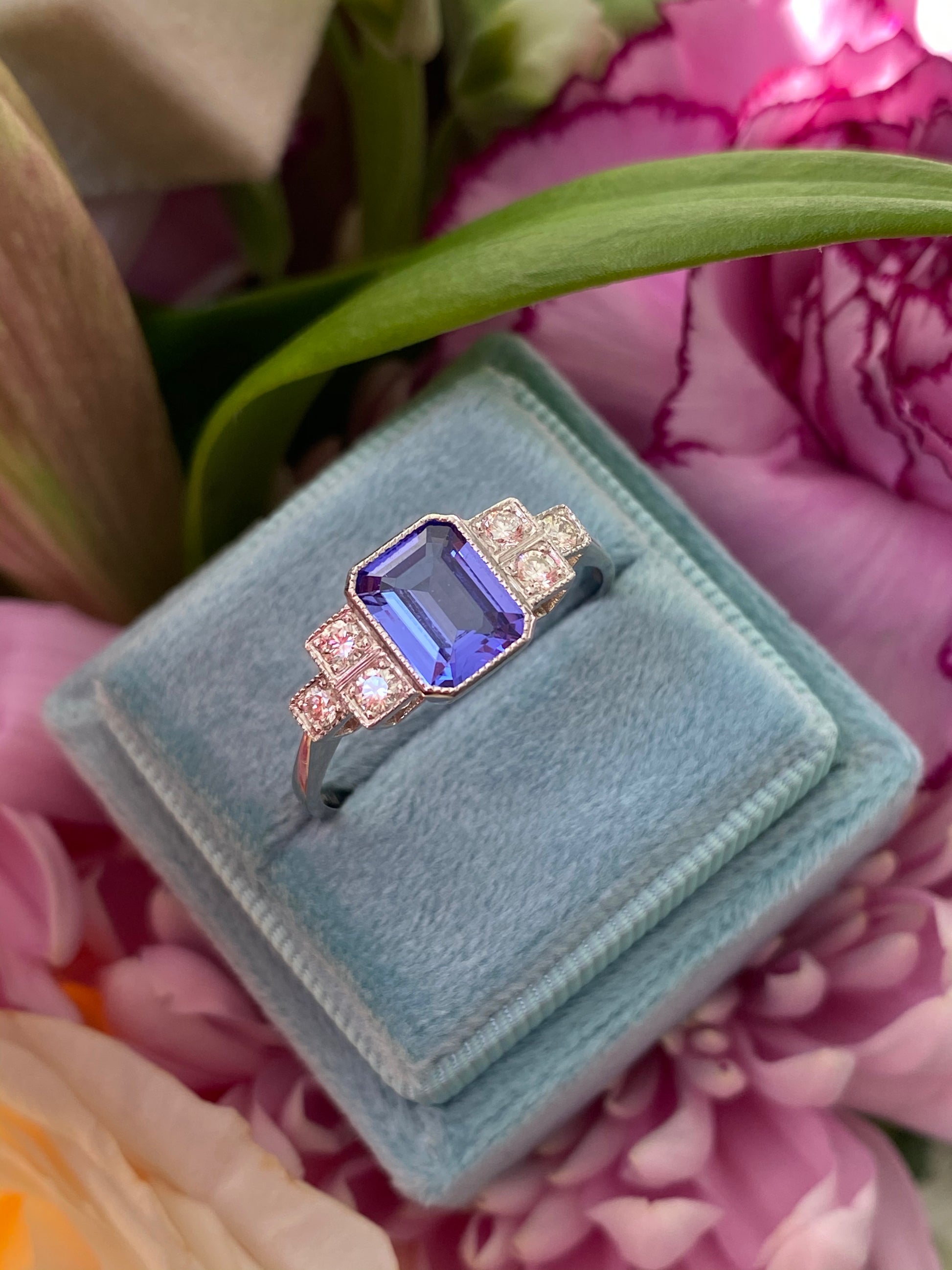 1.50 Carat Emerald Cut Tanzanite and Diamond Engagement Ring in Platinum 
