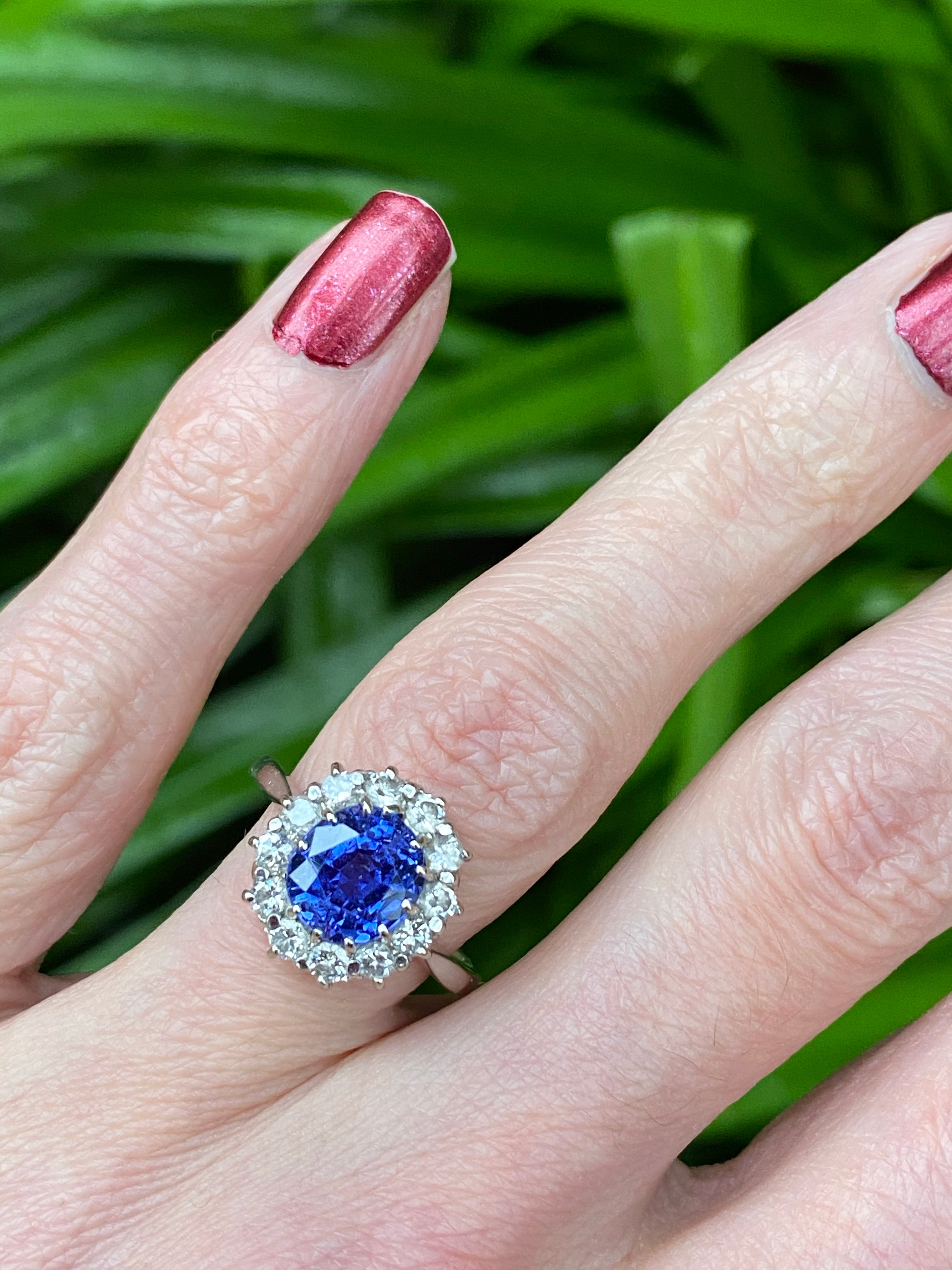 Antique 2.50 Carat Colour Change Sapphire and Diamond Halo Engagement Ring in Platinum