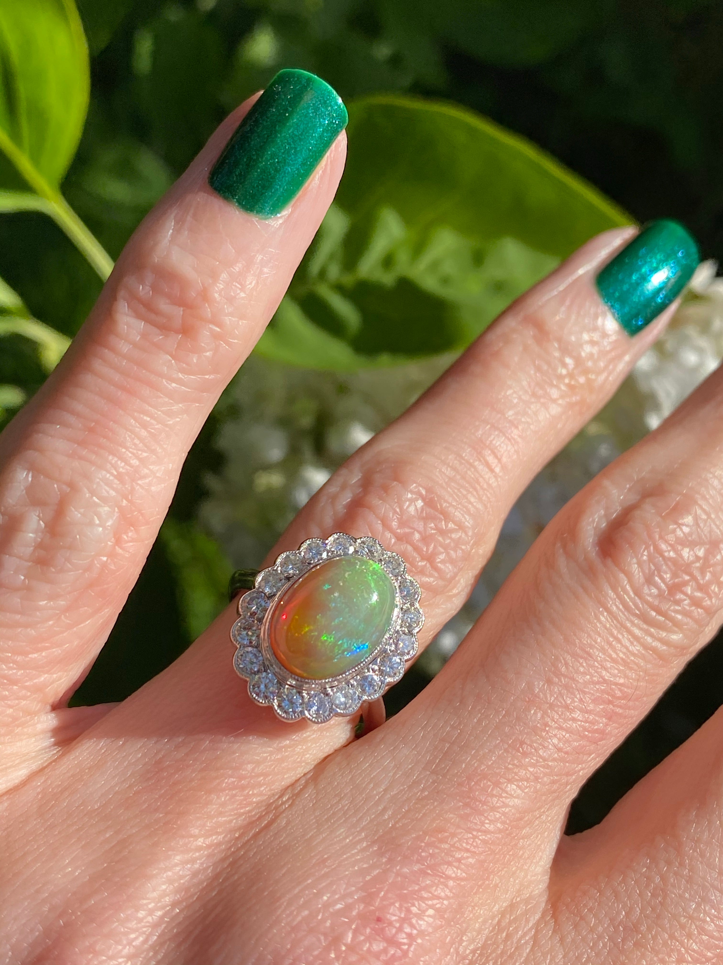 3.00 Carat Opal and Diamond Halo Ring in 18ct White Gold