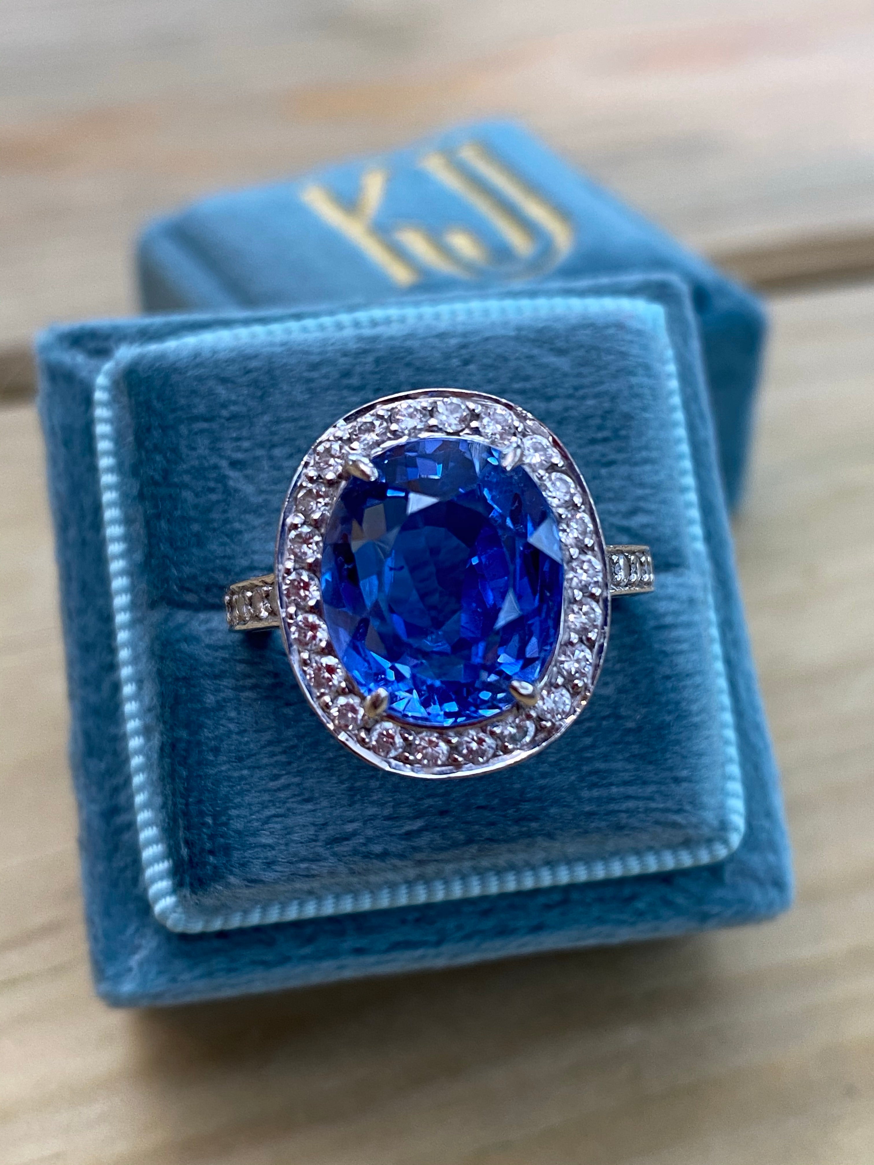 9.50 Oval-cut Carat Blue Ceylon Sapphire and DIamond Halo Ring 