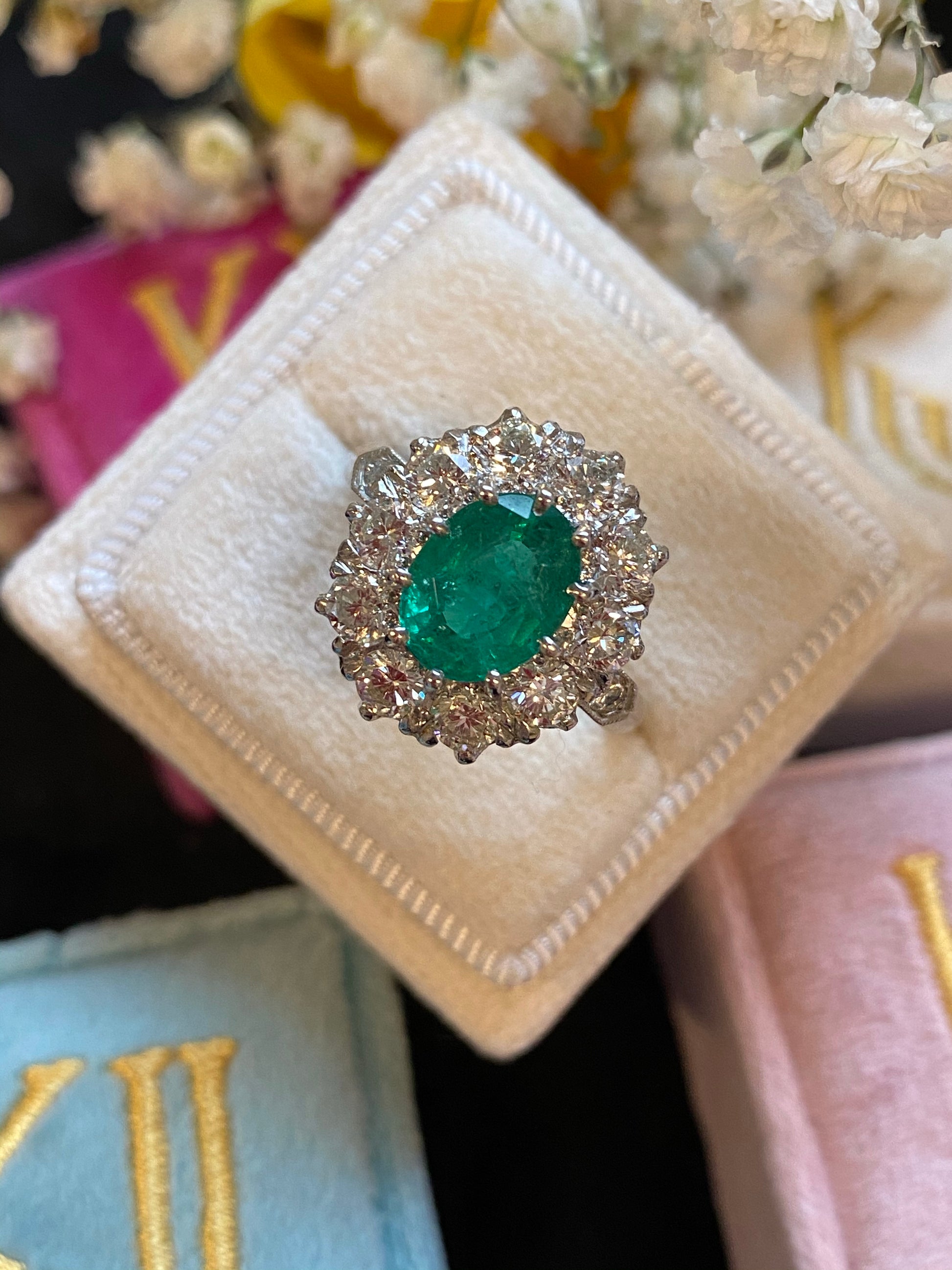 1.54 Carat Oval Cut Emerald and Diamond Halo Engagement Ring in Platinum 