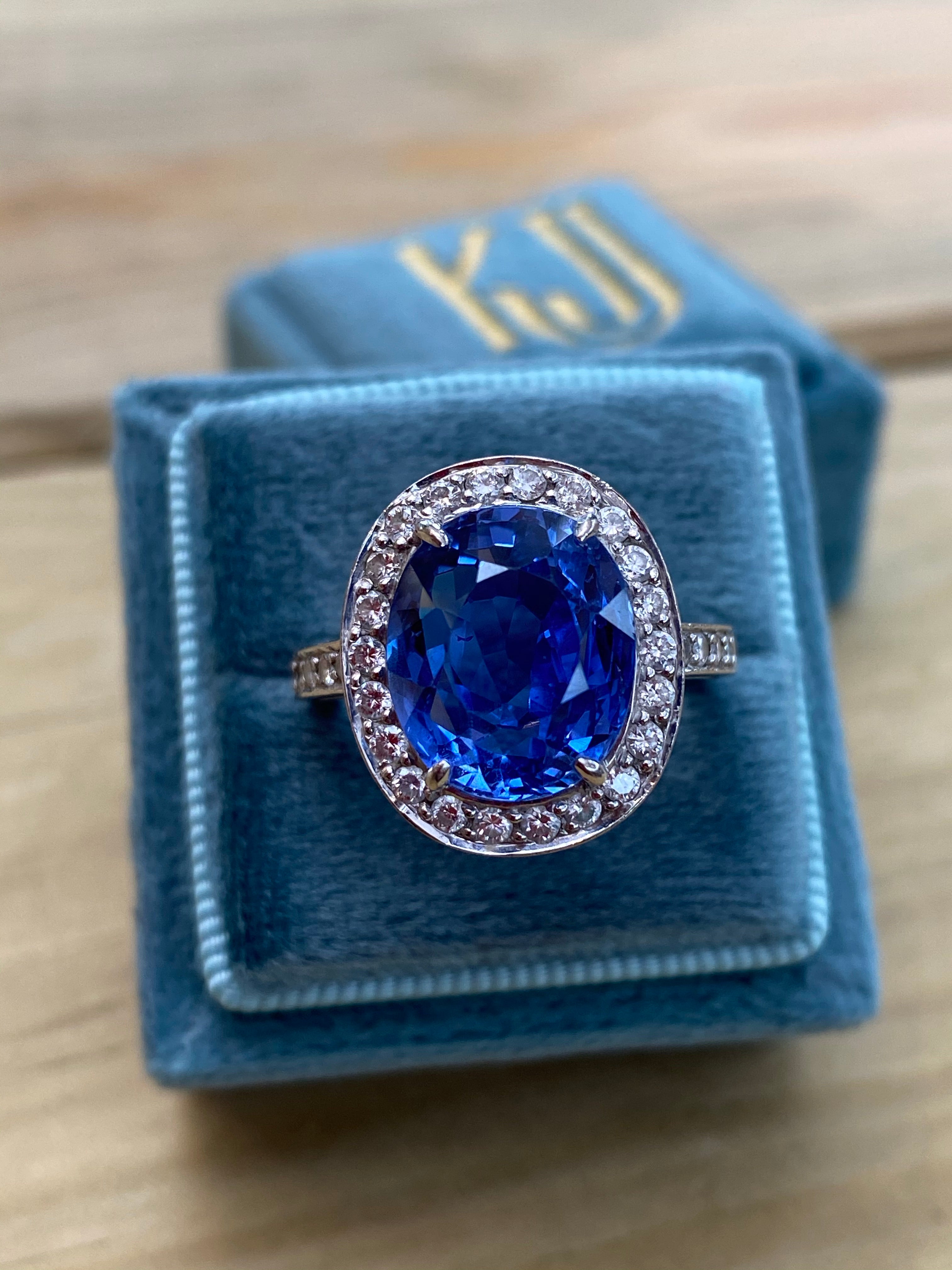 9.50 Oval-cut Carat Blue Ceylon Sapphire and DIamond Halo Ring 