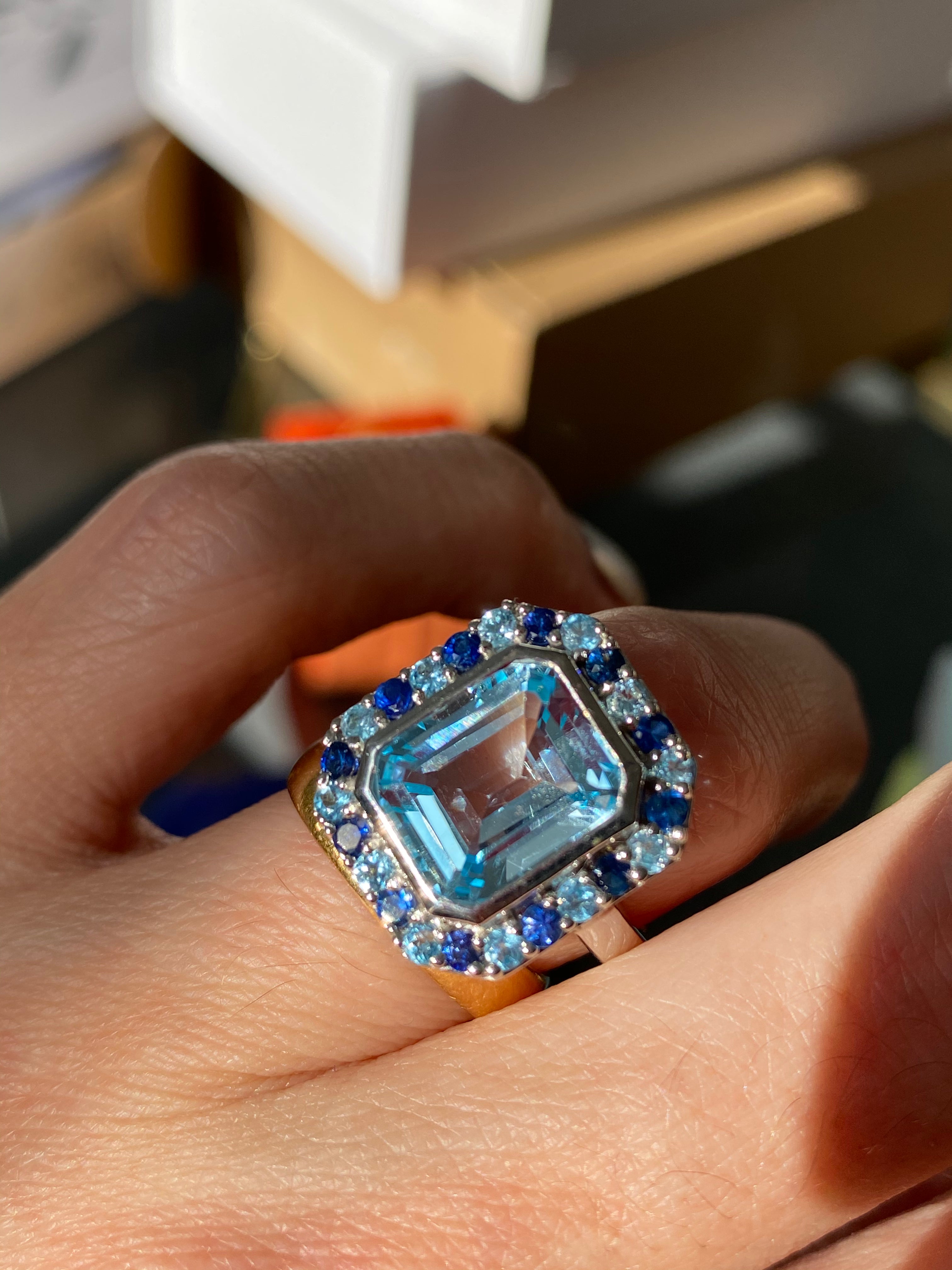 Blue Topaz and Blue Sapphire Halo Cocktail Ring in Sterling Silver
