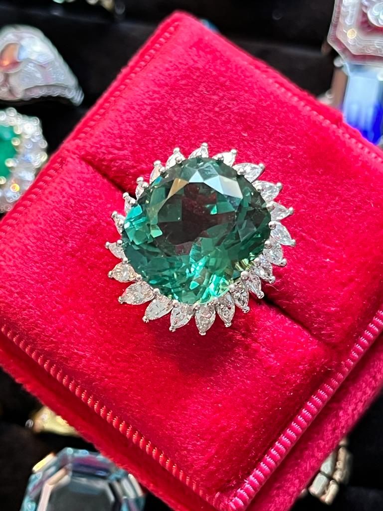 15.98 CTW Cushion Cut Green Tourmaline and Diamond Halo Ring in 18ct White Gold