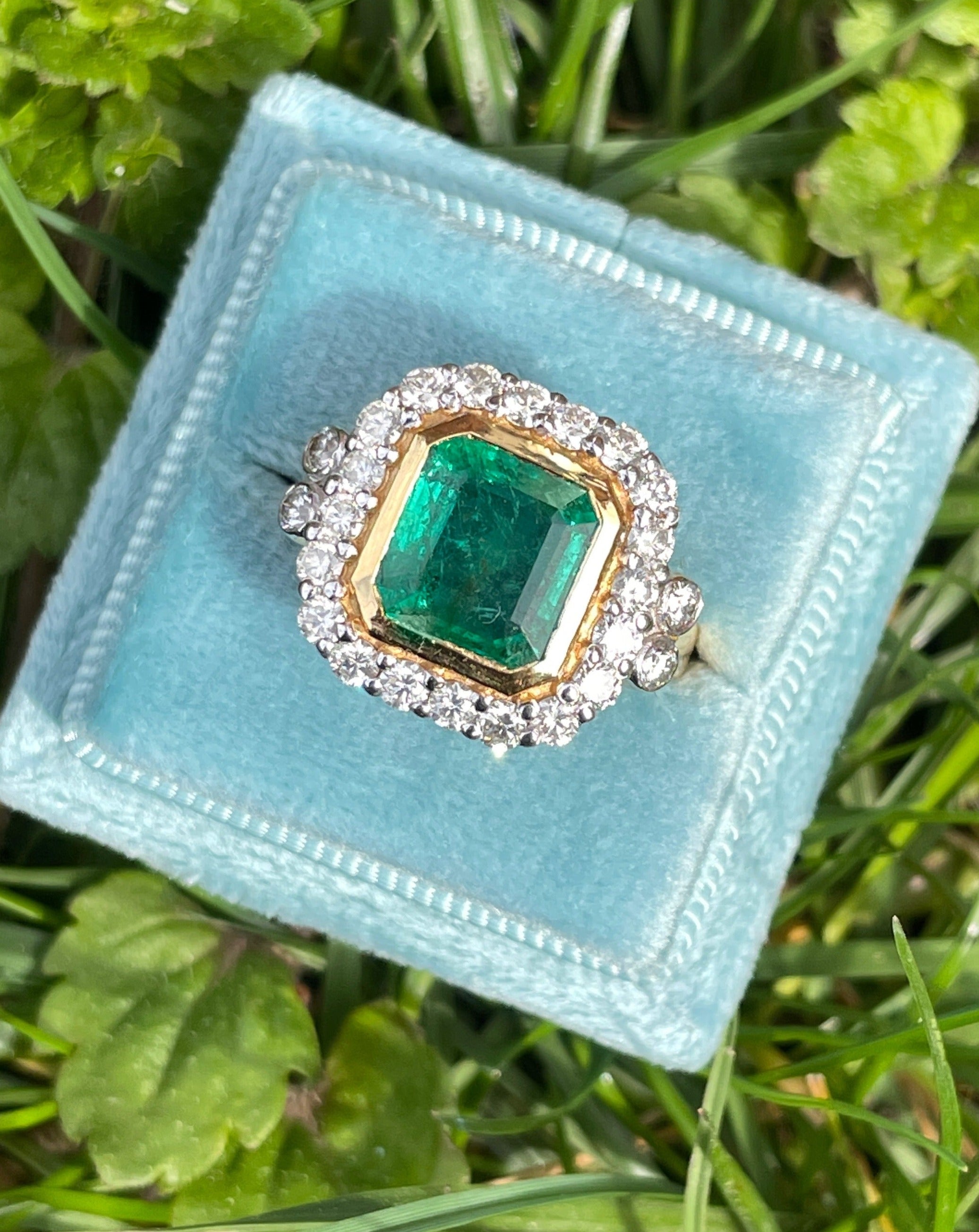 3 Carat Emerald and Diamond Halo Bezel Set Cocktail Engagement Ring in White and Yellow Gold 
