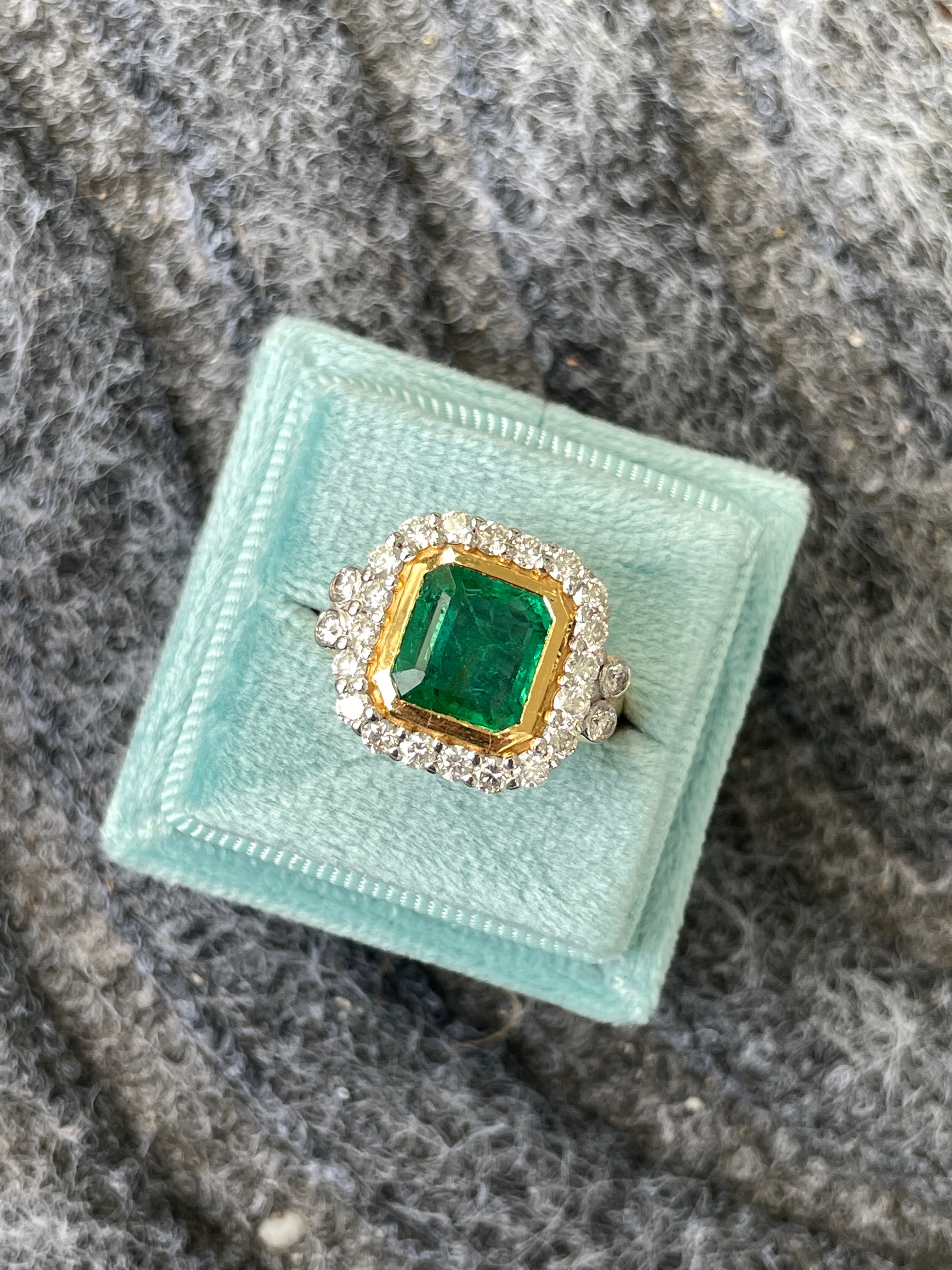 3 Carat Emerald and Diamond Halo Bezel Set Cocktail Engagement Ring in White and Yellow Gold 