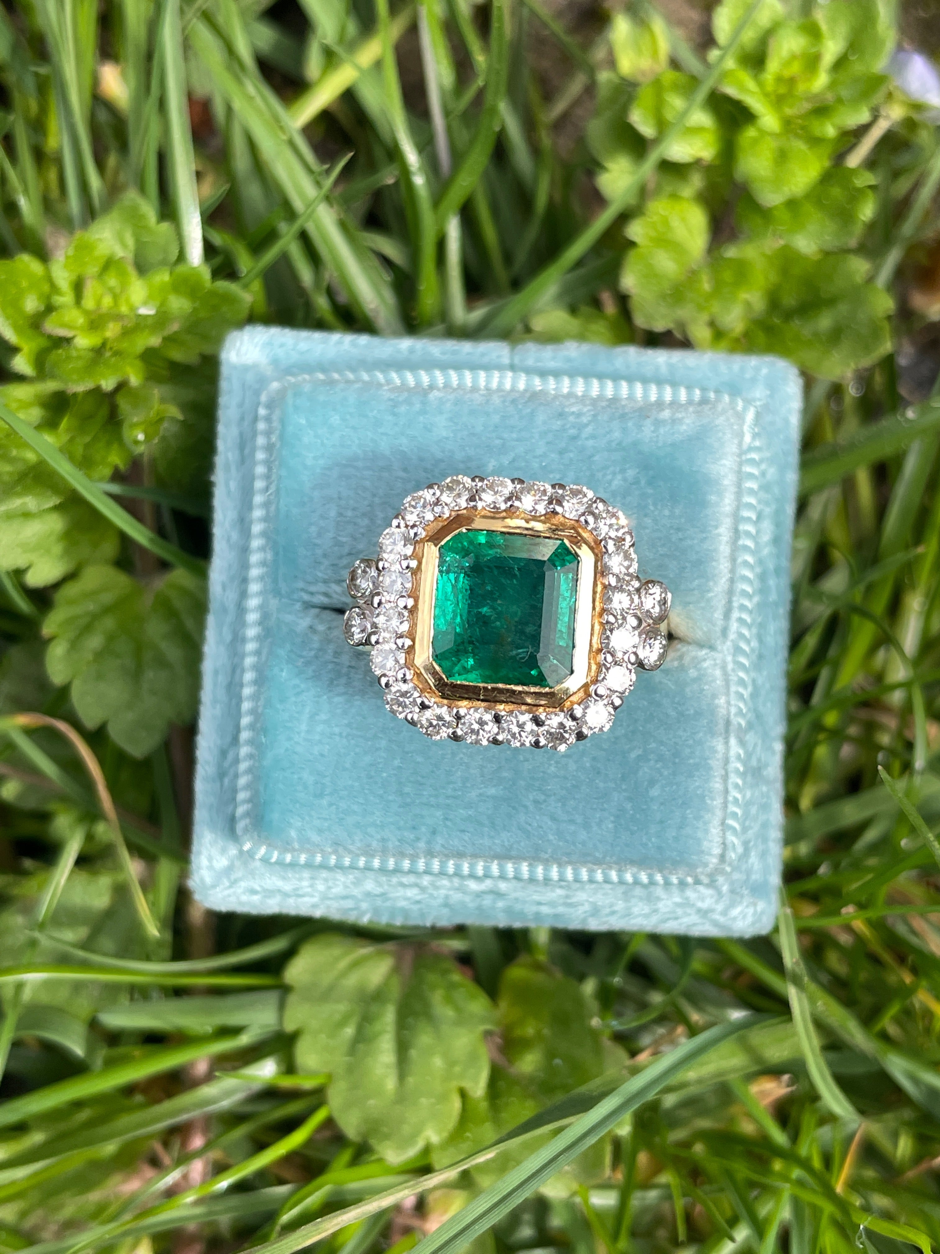 3 Carat Emerald and Diamond Halo Bezel Set Cocktail Engagement Ring in White and Yellow Gold 
