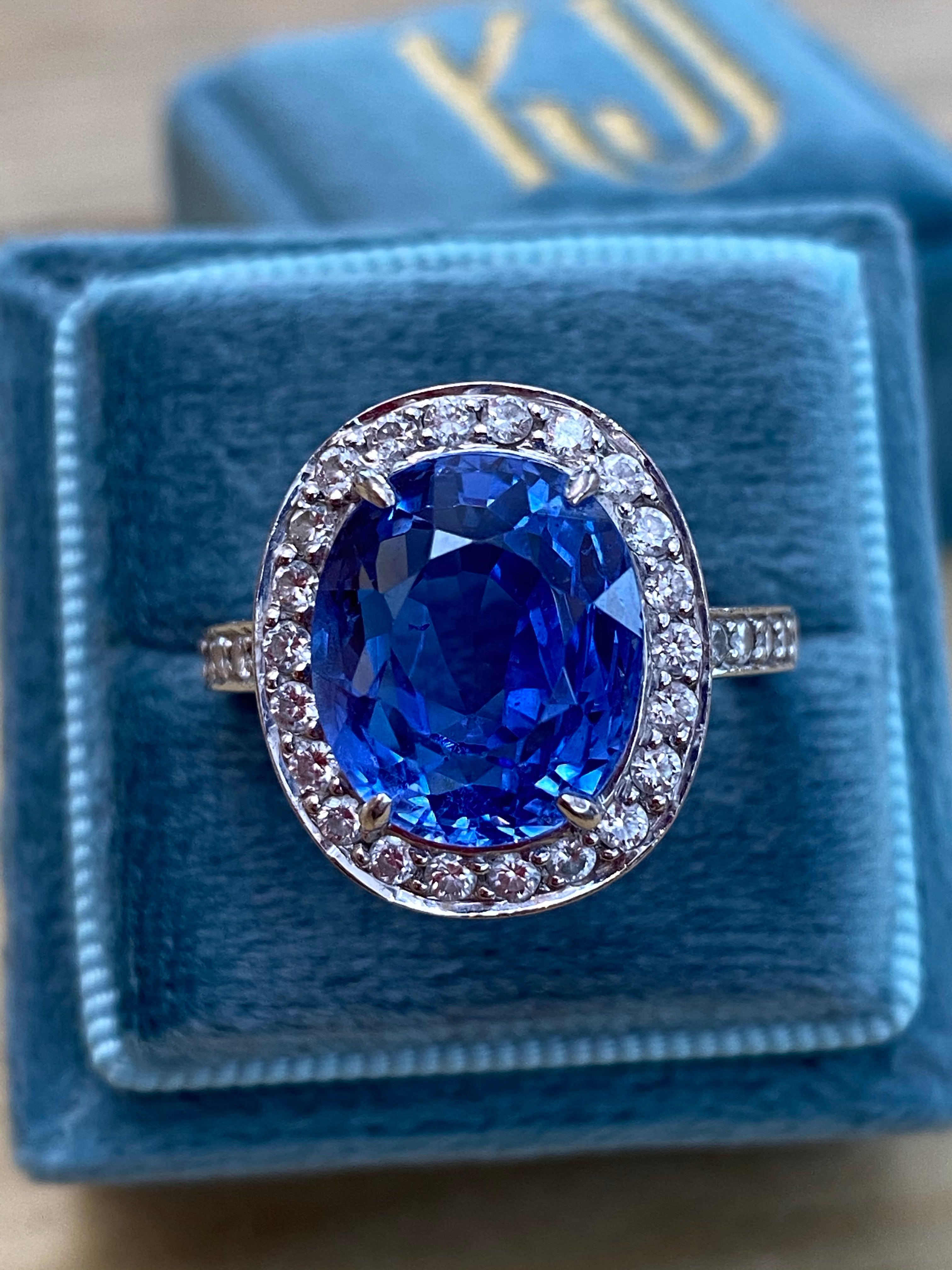9.50 Oval-cut Carat Blue Ceylon Sapphire and DIamond Halo Ring 