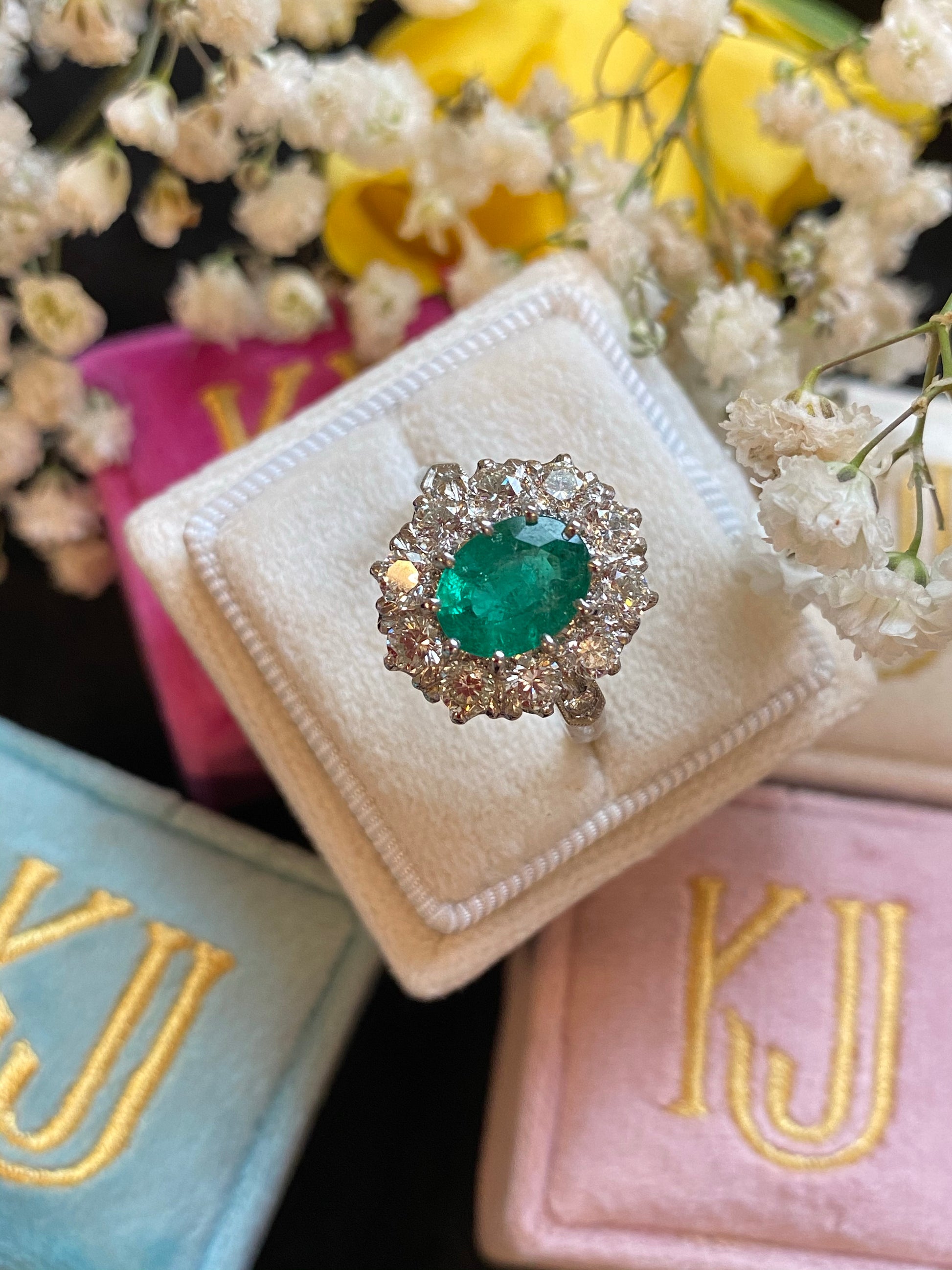 1.54 Carat Oval Cut Emerald and Diamond Halo Engagement Ring in Platinum 