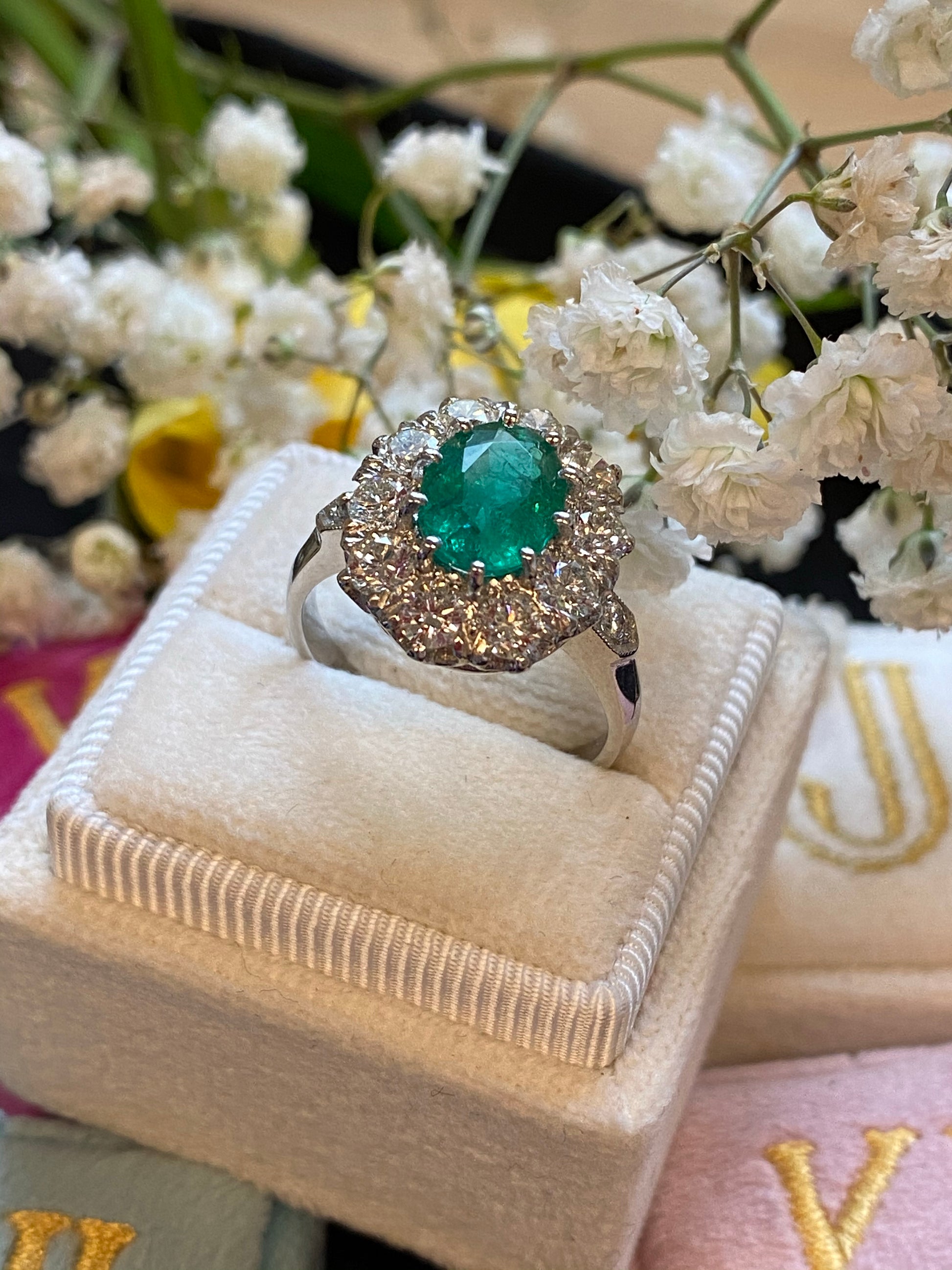 1.54 Carat Oval Cut Emerald and Diamond Halo Engagement Ring in Platinum 