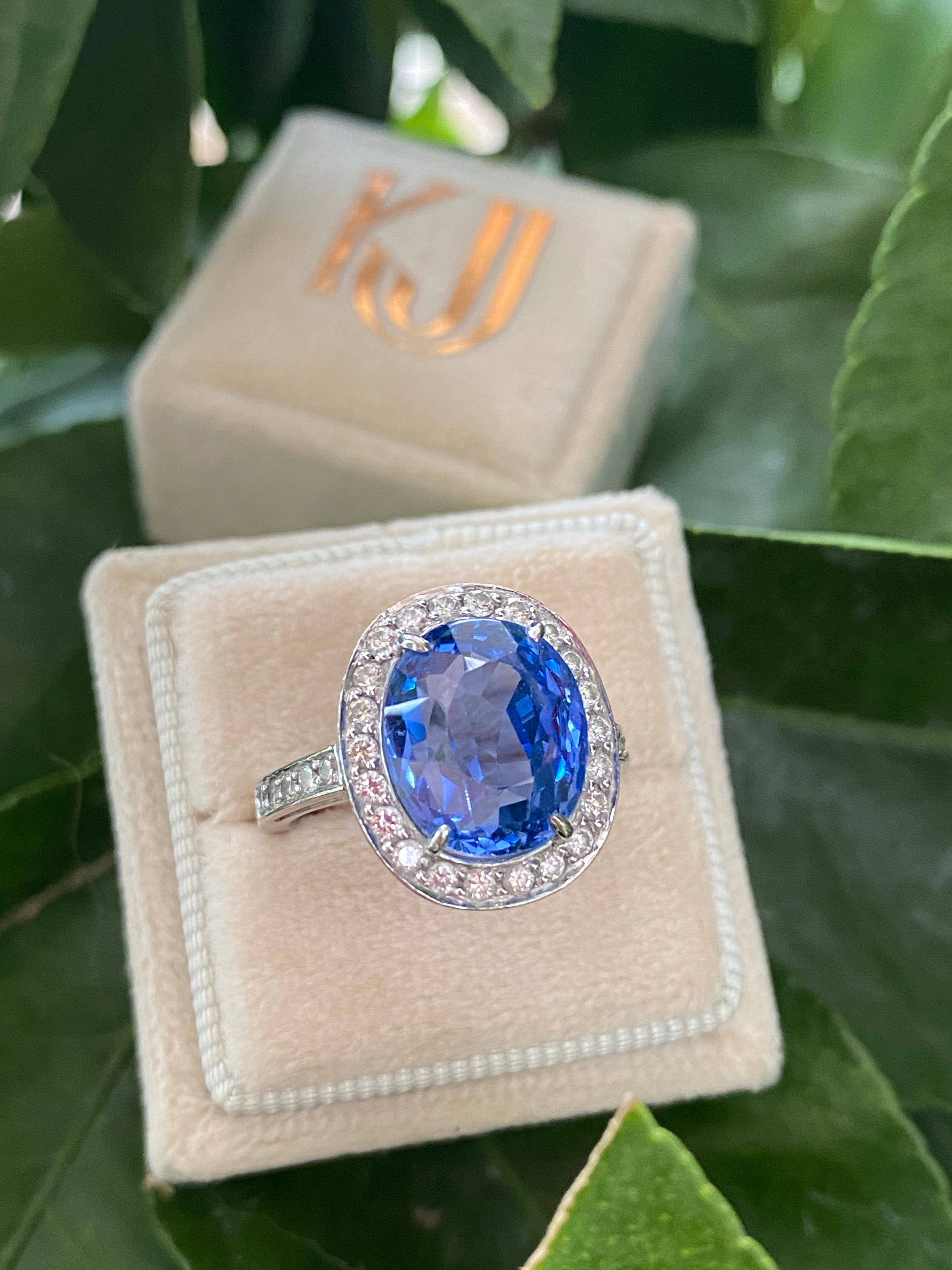 9.50 Oval-cut Carat Blue Ceylon Sapphire and DIamond Halo Ring 